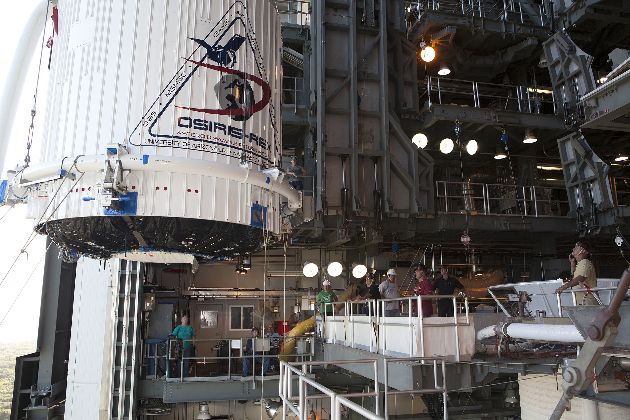 The OSIRIS-REx spacecraft, enclosed in a payload fairing, is lifted Aug. 29 at Space Launch Complex 41 at Cape Canaveral Air For