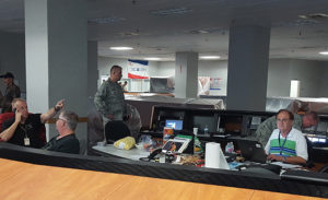 Members of the NASA Kennedy Space Center in Florida rideout team prepare for Hurricane Matthew in the emergency operations center in Kennedy's Launch Control Center on Oct. 6, 2016.