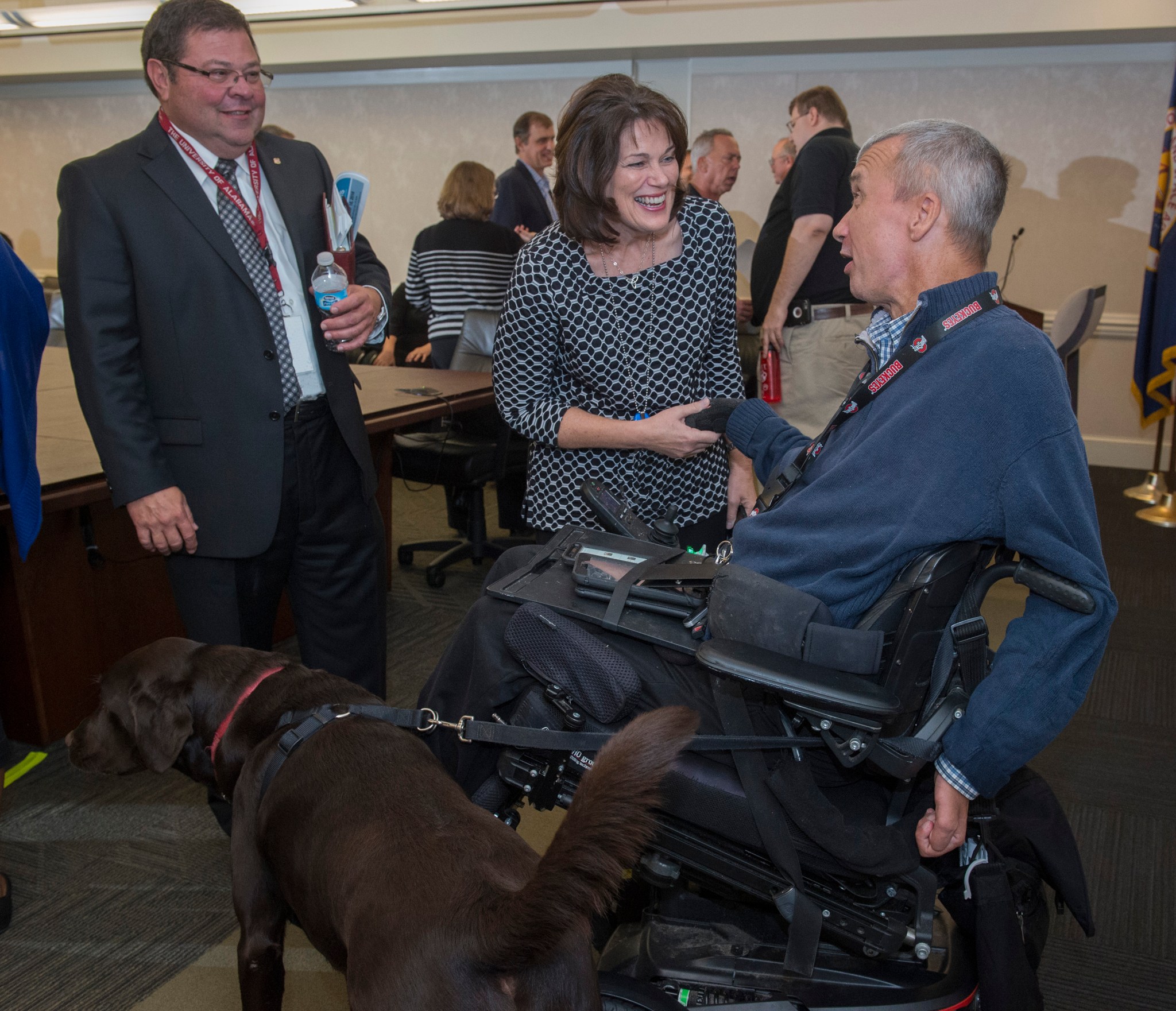 Jim Duffy, right, with his dog Macchiato, talks with Robin Henderson, center, and Paul Gilbert.