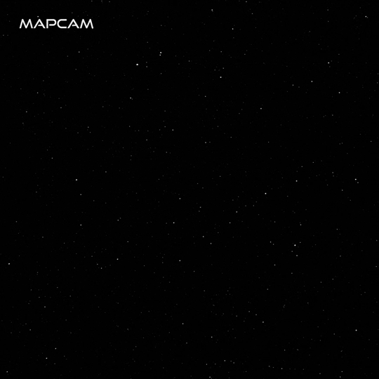 moving image zooming in on a starfield