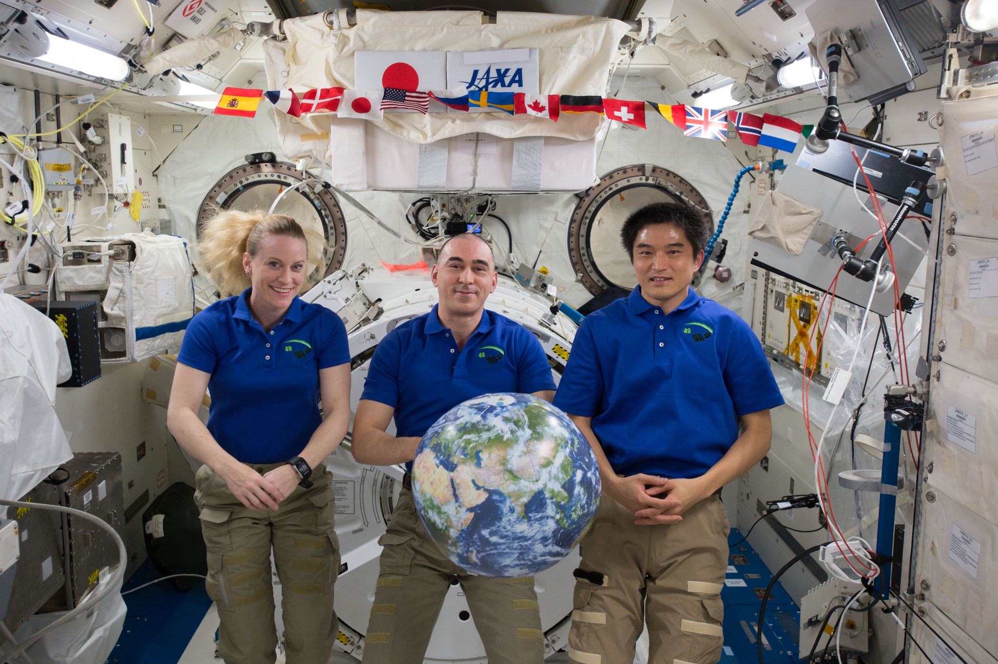 Expedition 49 crew members Kate Rubins of NASA, Anatoly Ivanishin of Roscosmos and Takuya Onishi of the Japan Aerospace Agency.