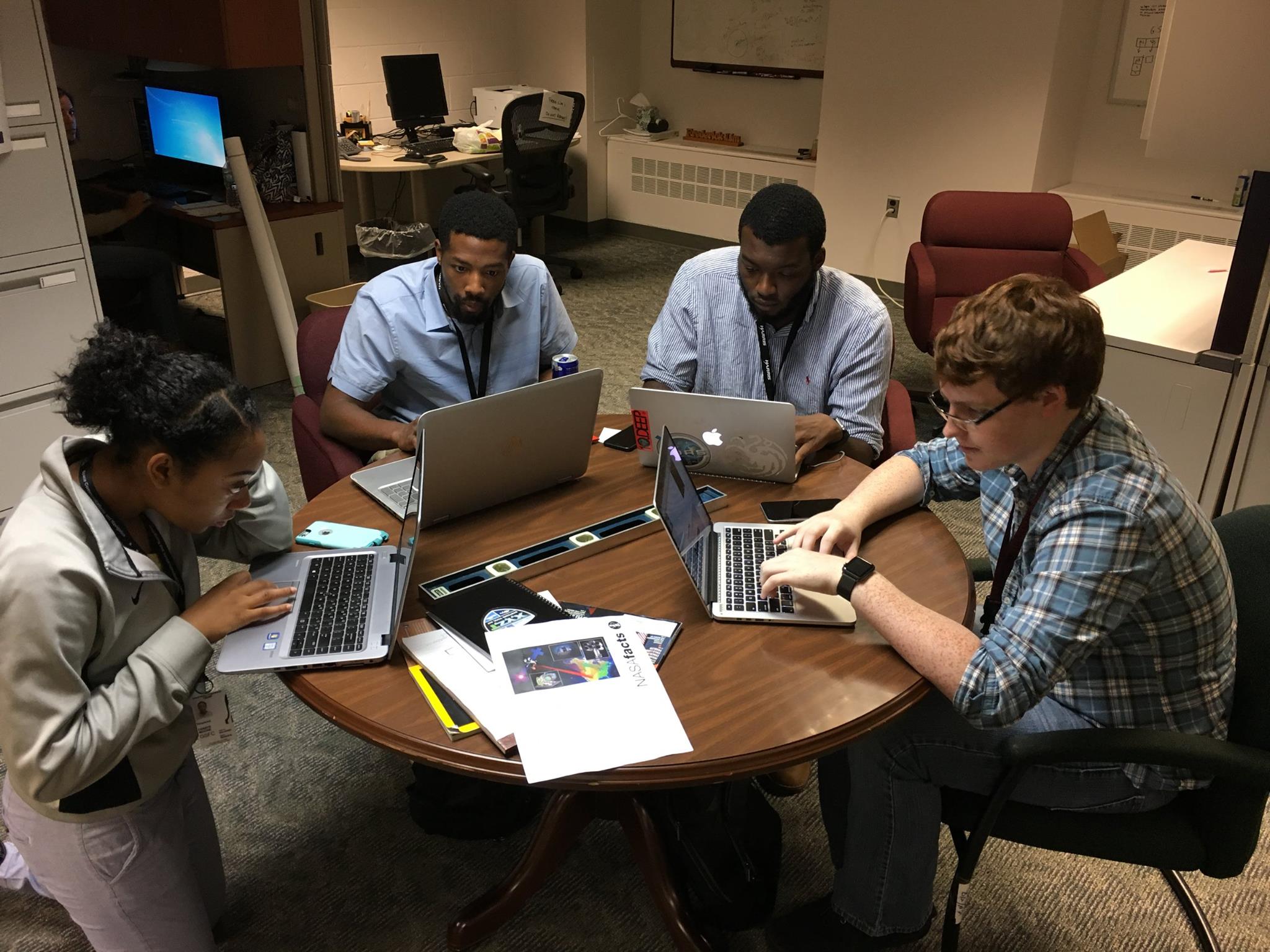 four interns with the Exploration and Space Communications division at NASA Goddard