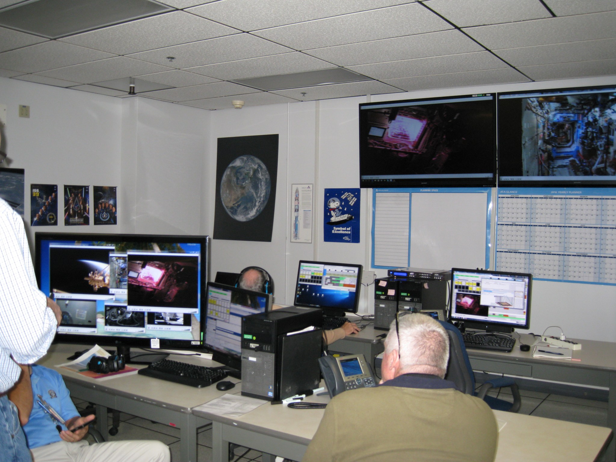 Veggie team members monitor Veg-03 activation aboard the International Space Station