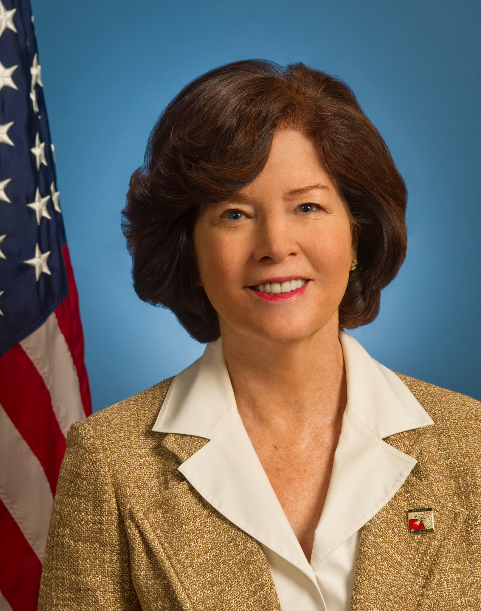 mugshot of woman with flag