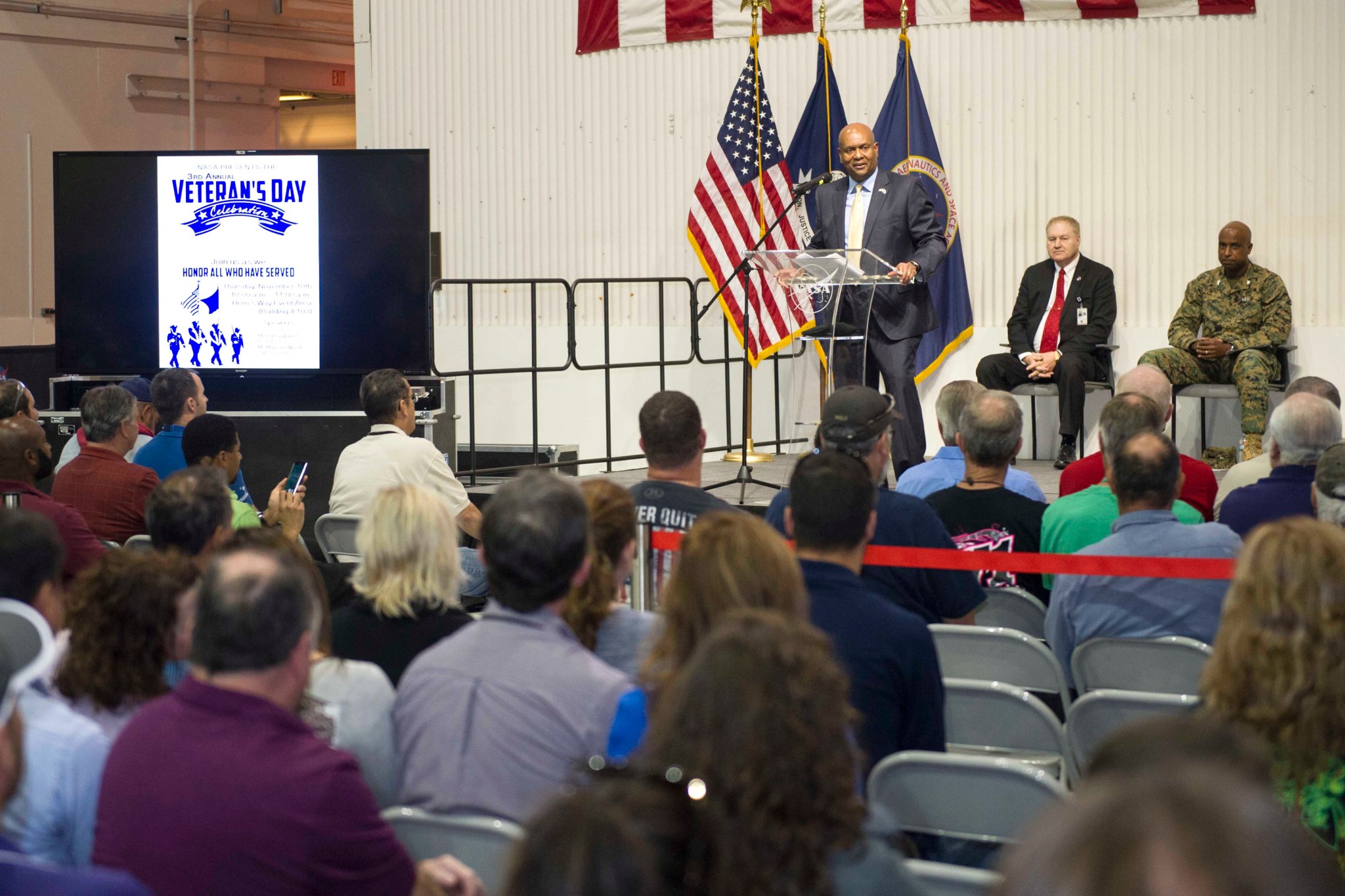 Bobby Watkins, left, welcomes team members to Michoud's third Annual Veterans Day Celebration Nov. 10. 