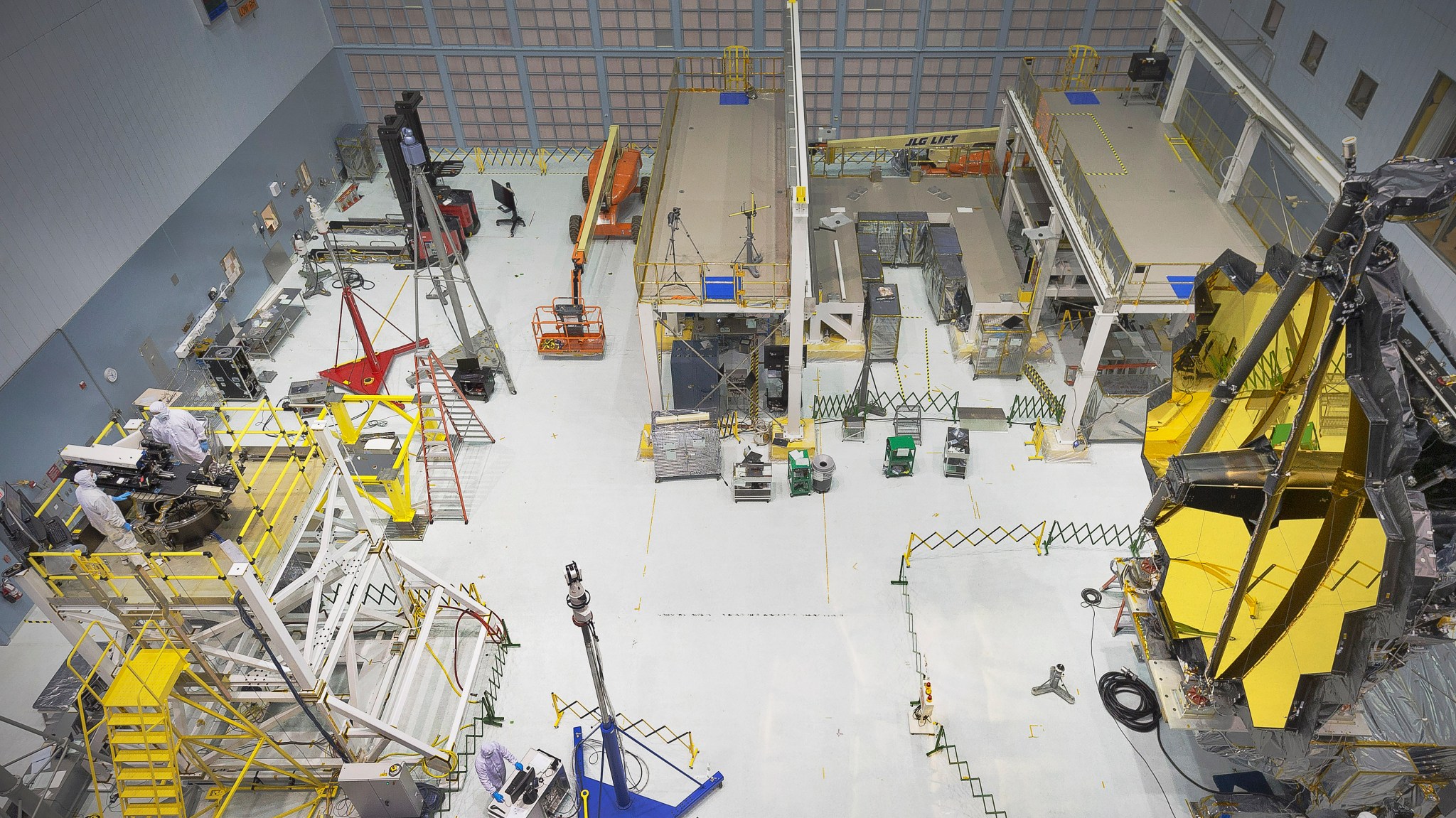 Engineers conduct a "Center of Curvature" test on NASA's James Webb Space Telescope in the clean room.