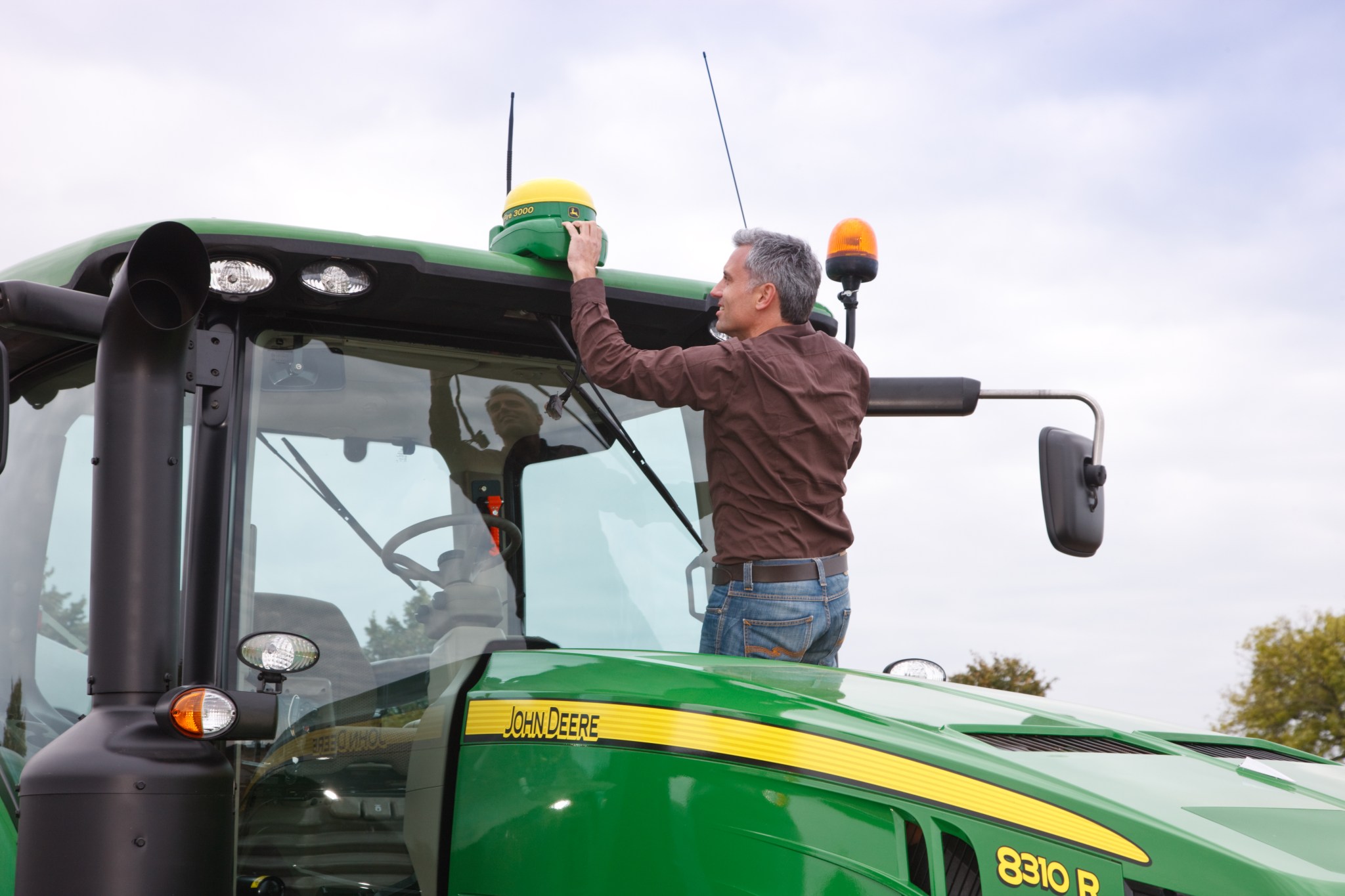 John Deere says it will make the tractor of the future — no driver needed