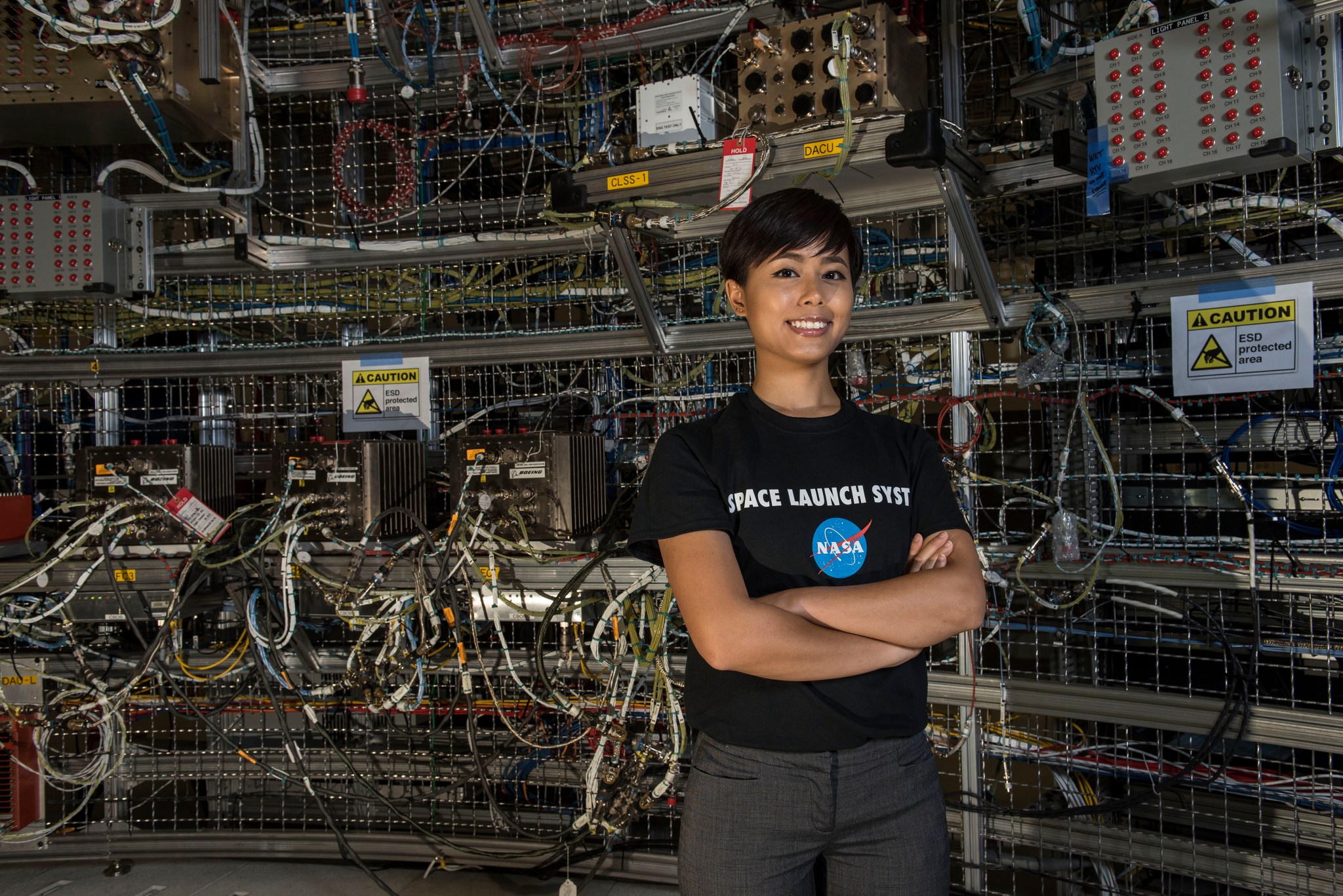 Ratana Meekham, a Qualis Corp. electrical integration technician at Marshall, is helping test avionics hardware SLS.