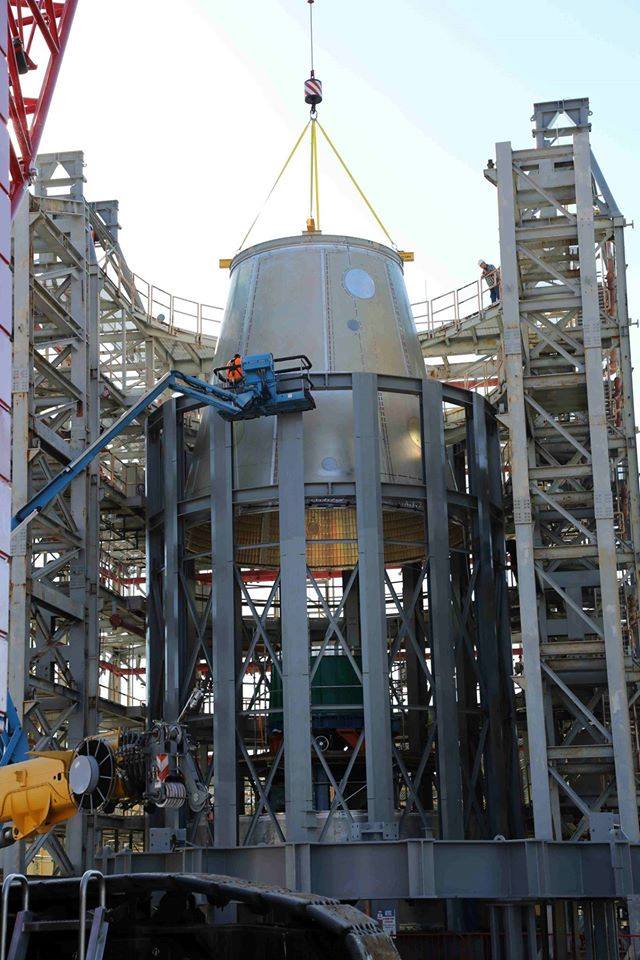 A test version of the SLS launch vehicle stage adapter goes into a Marshall test stand Oct. 12. 