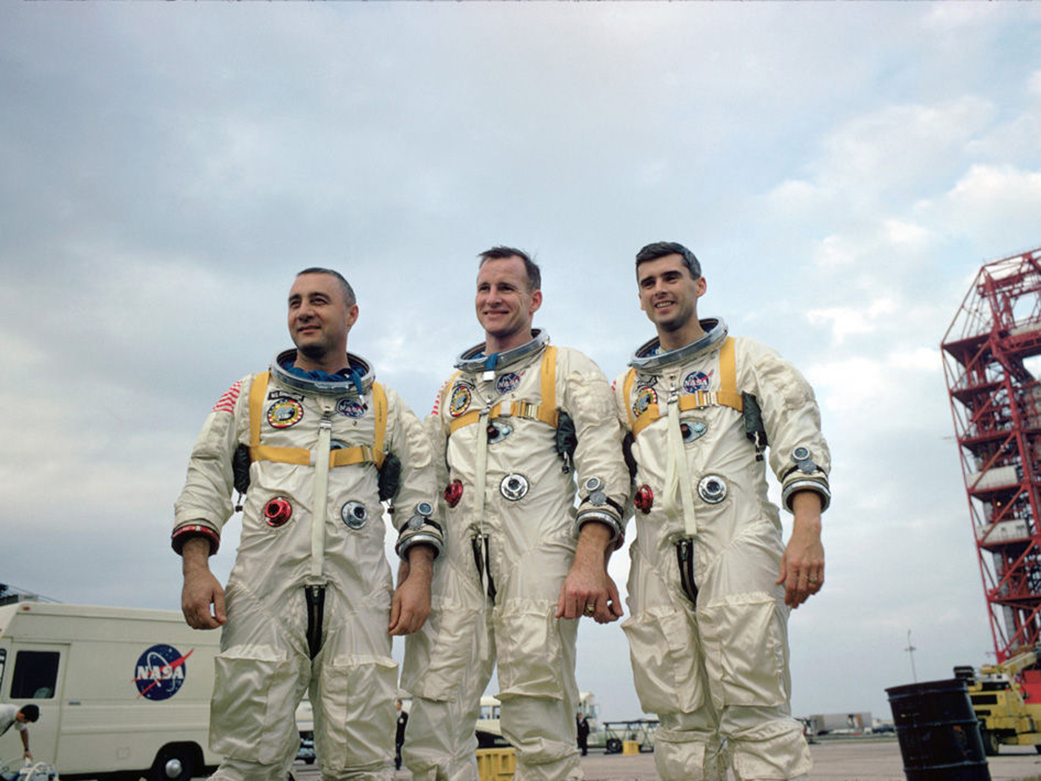 NASA astronauts, from left, Virgil "Gus" Grissom, Edward White II and Roger Chaffee visit the Cape Kennedy launch pad.