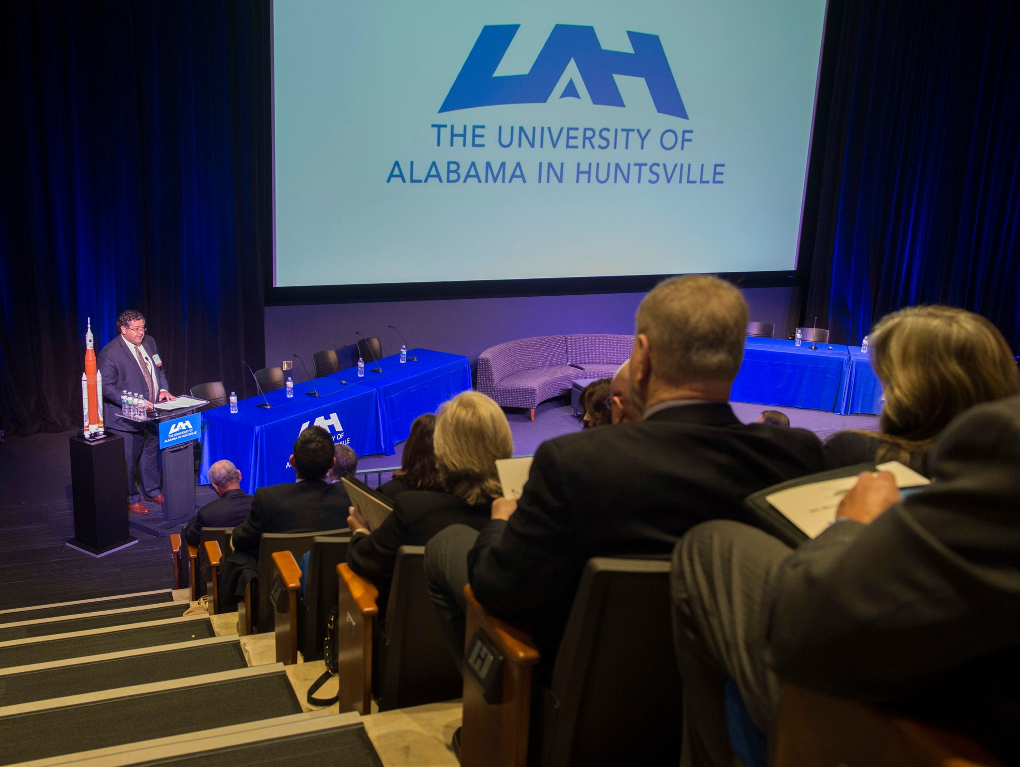 Marshall Center Director Todd May welcomes the crowd to the ninth annual Wernher von Braun Symposium Oct. 25-27. 