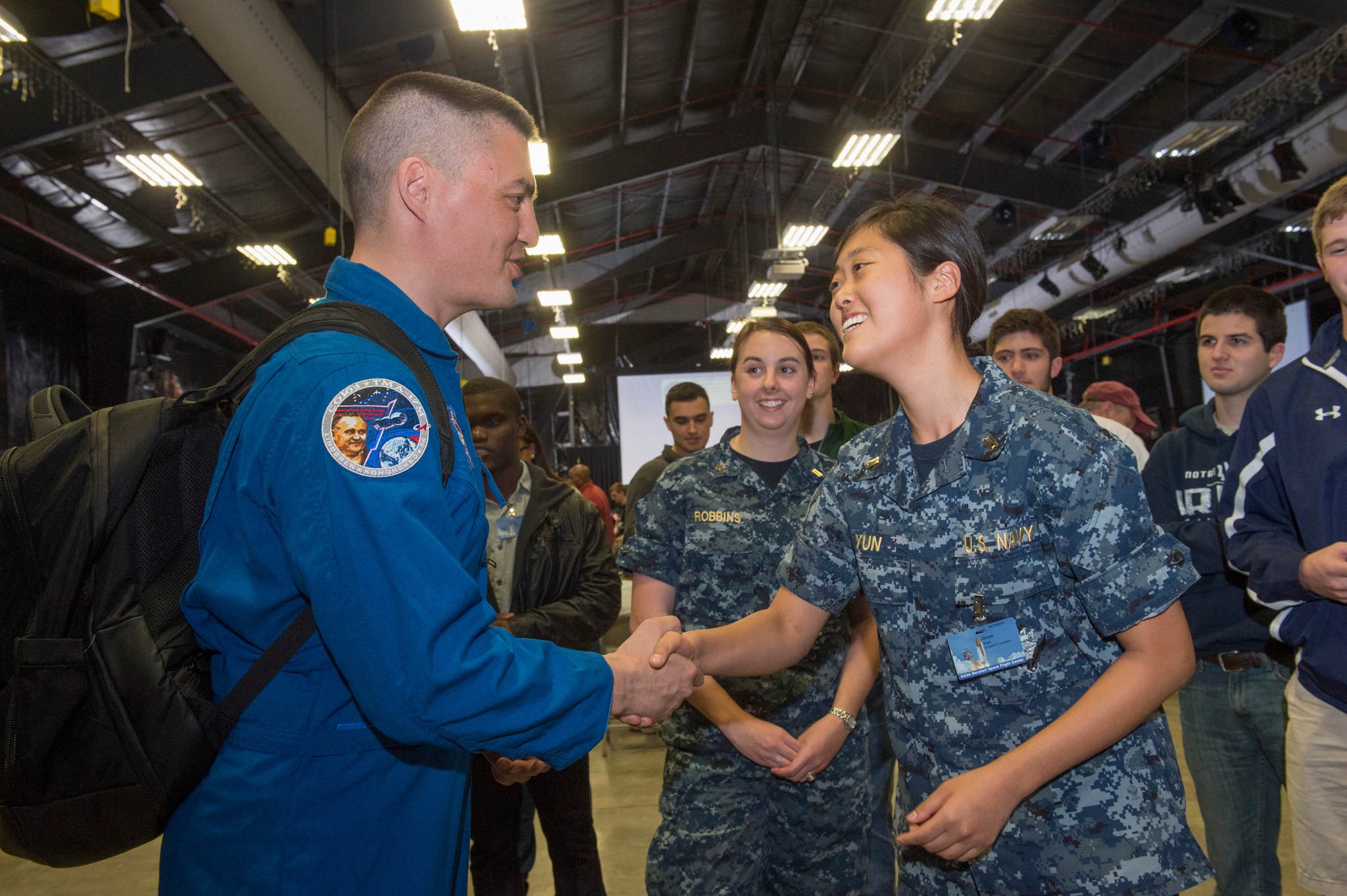 During his visit, Lindgren speaks with students who were at Marshall for NASA Student Launch, including Midshipman Zenas Yun.