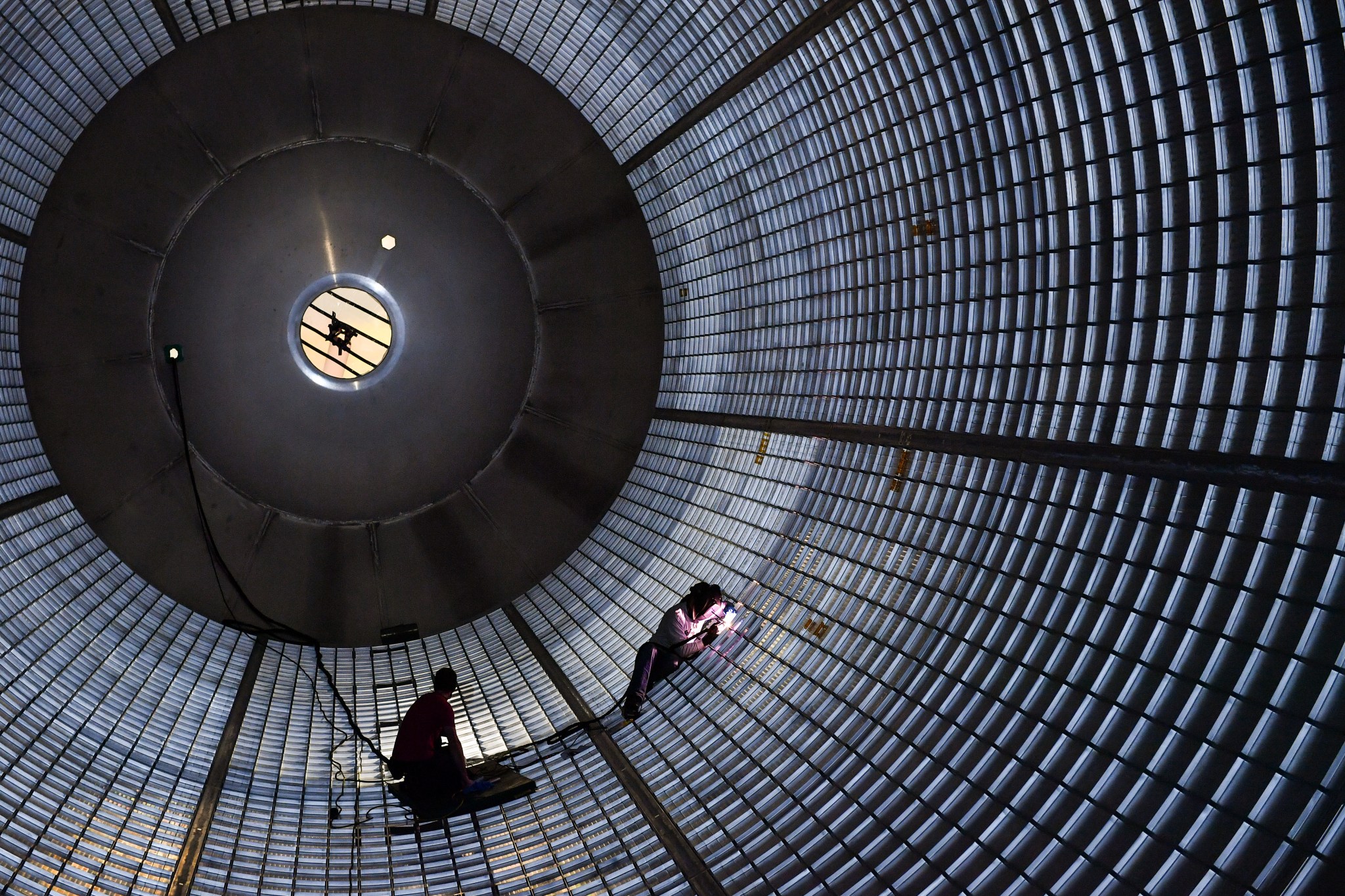 welders in liquid hydrogen tank