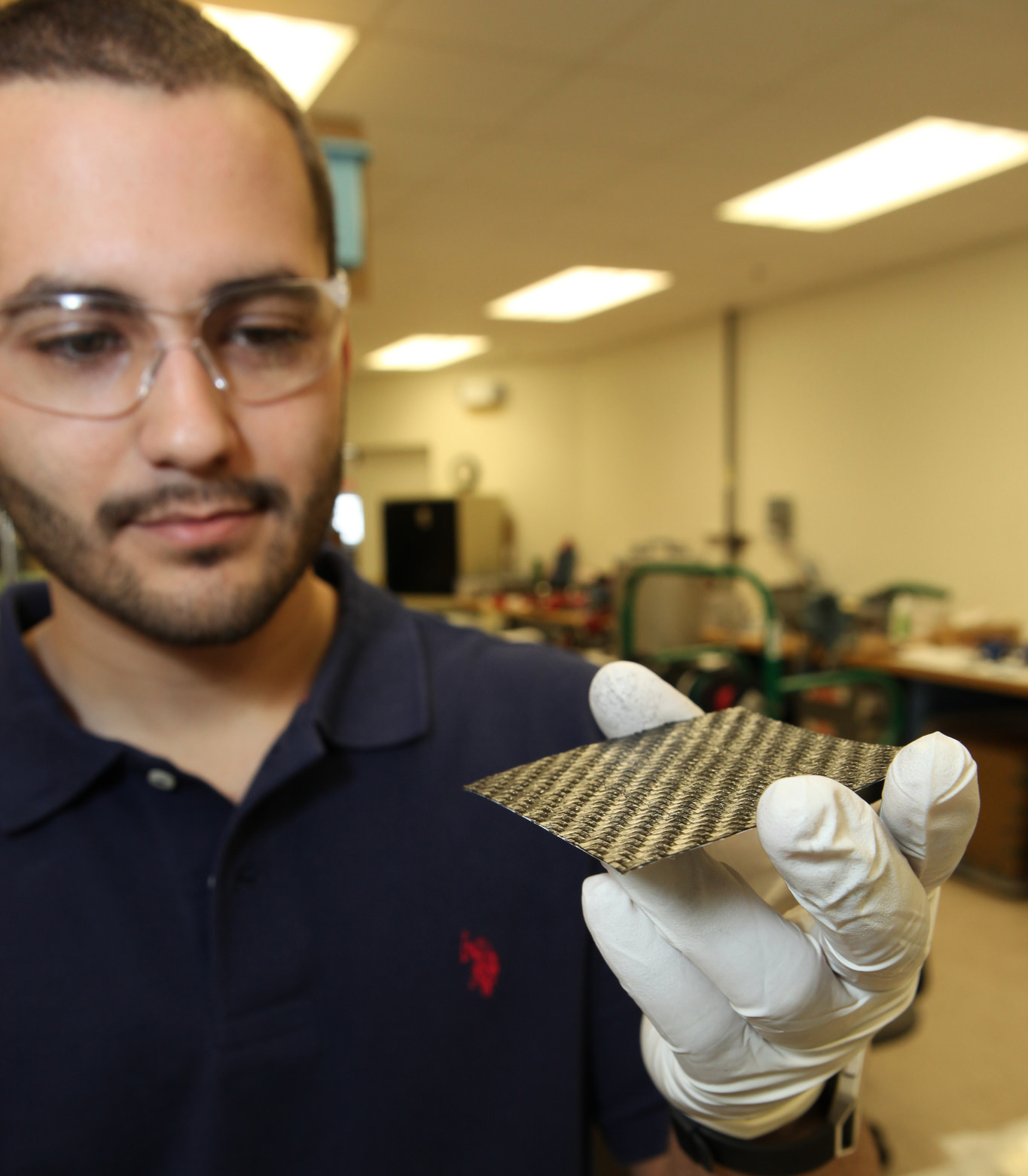 The structure for a new battery prototype is prepared in the Prototype Laboratory at NASA's Kennedy Space Center in Florida.