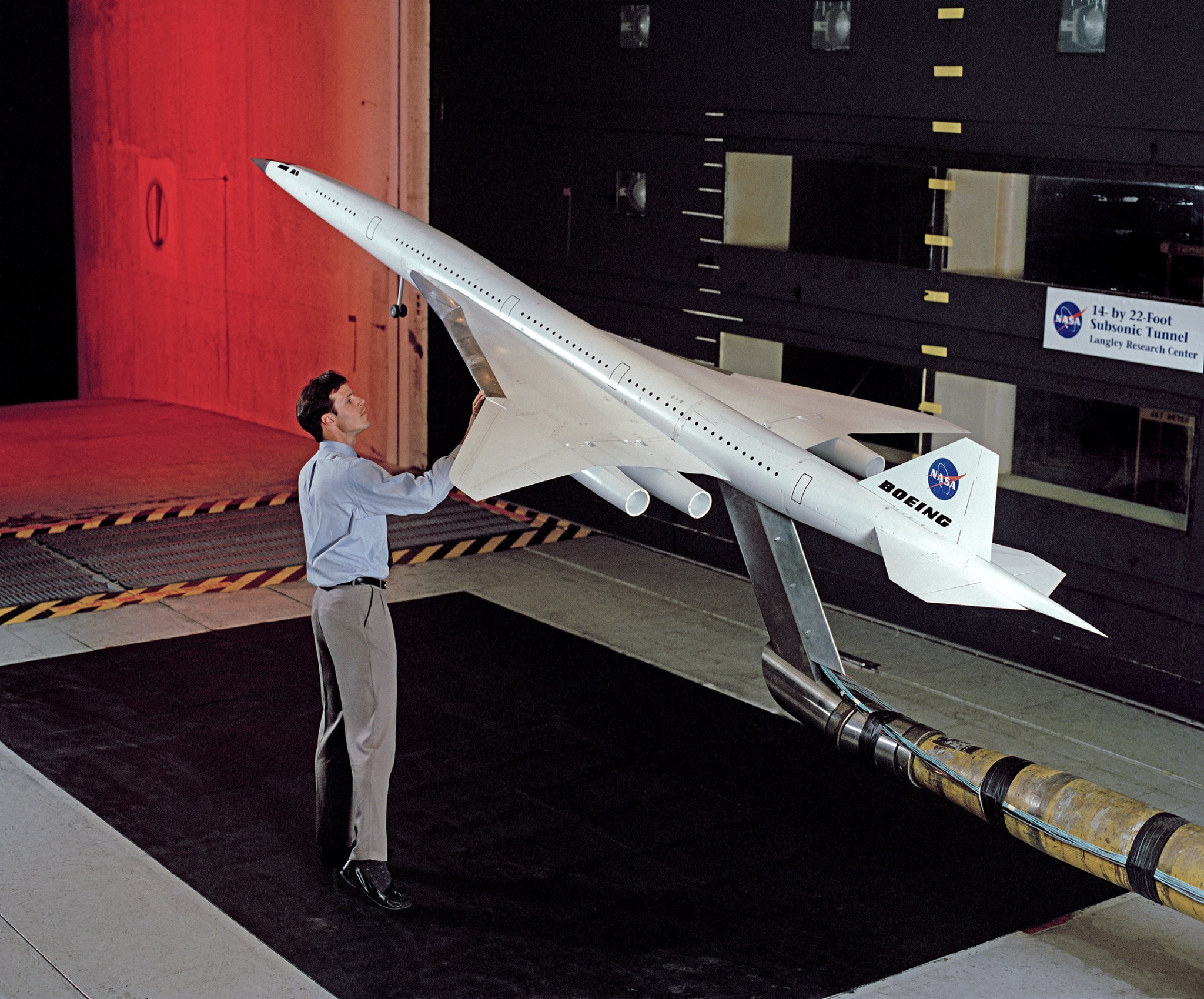 NASA engineer prepares early high-speed civil transport model for wind tunnel testing