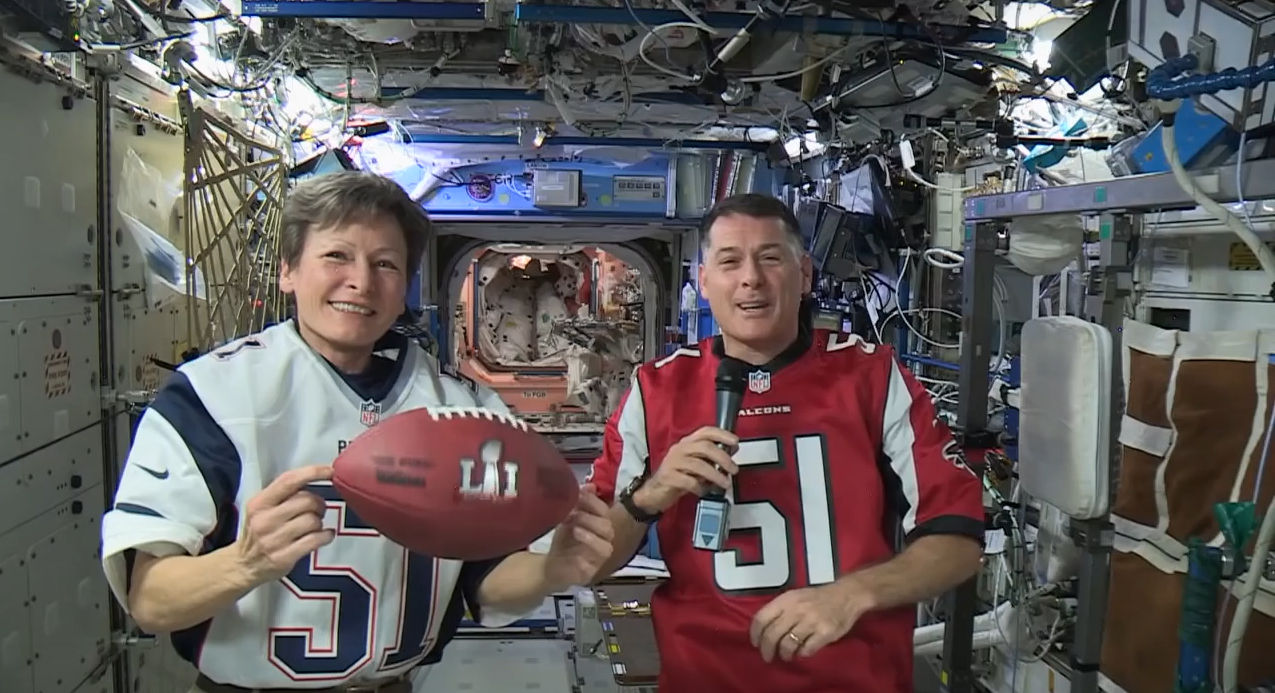 NASA astronauts Peggy Whitson and Shane Kimbrough for Super Bowl LI