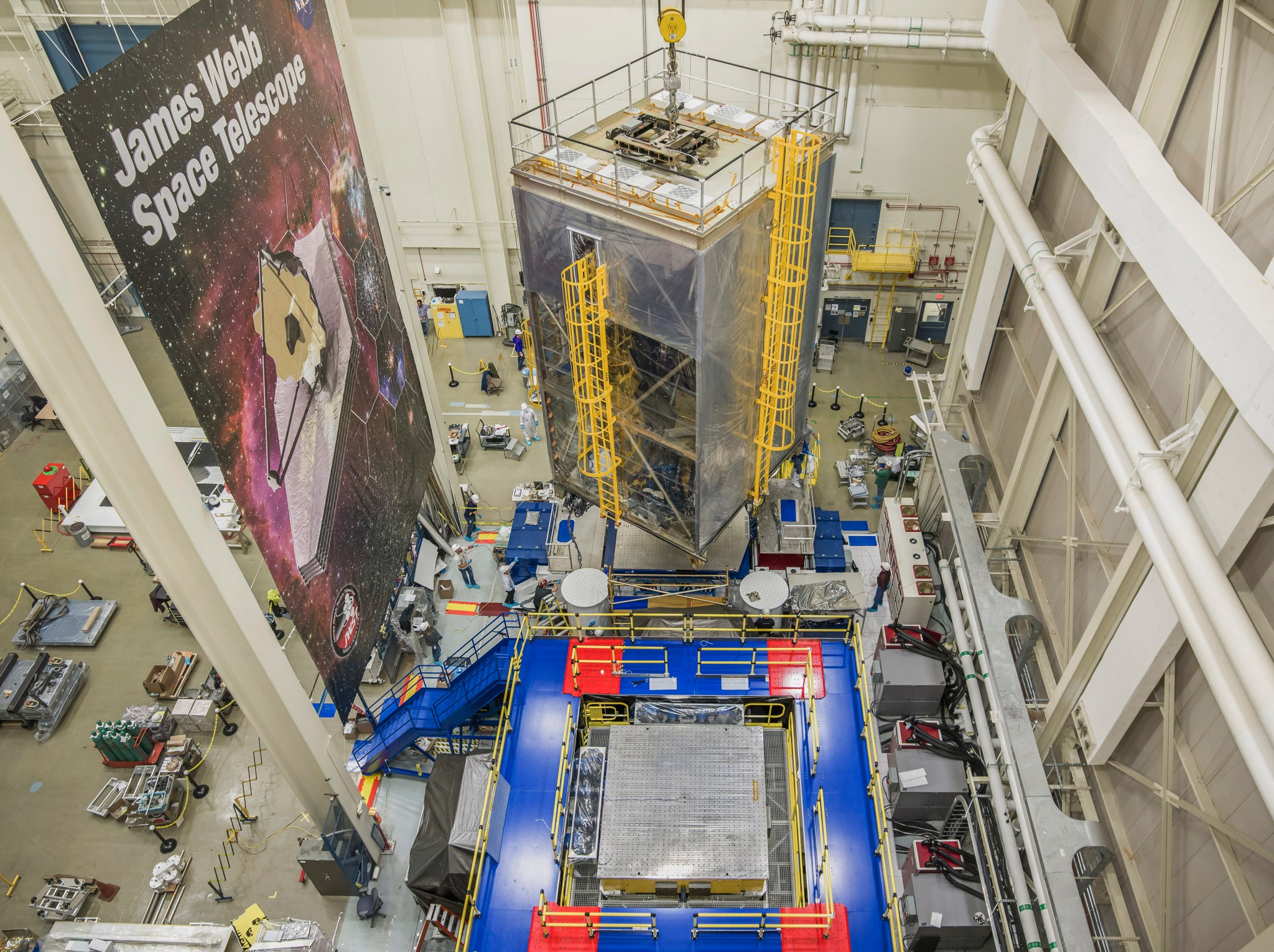 NASA engineers and technicians perform vibration testing on the James Webb Space Telescope.
