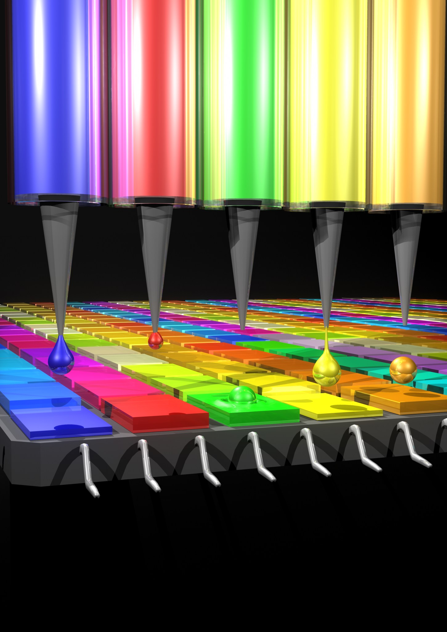 This illustration shows how a device prints the quantum dot filters that absorb different wavelengths of light.