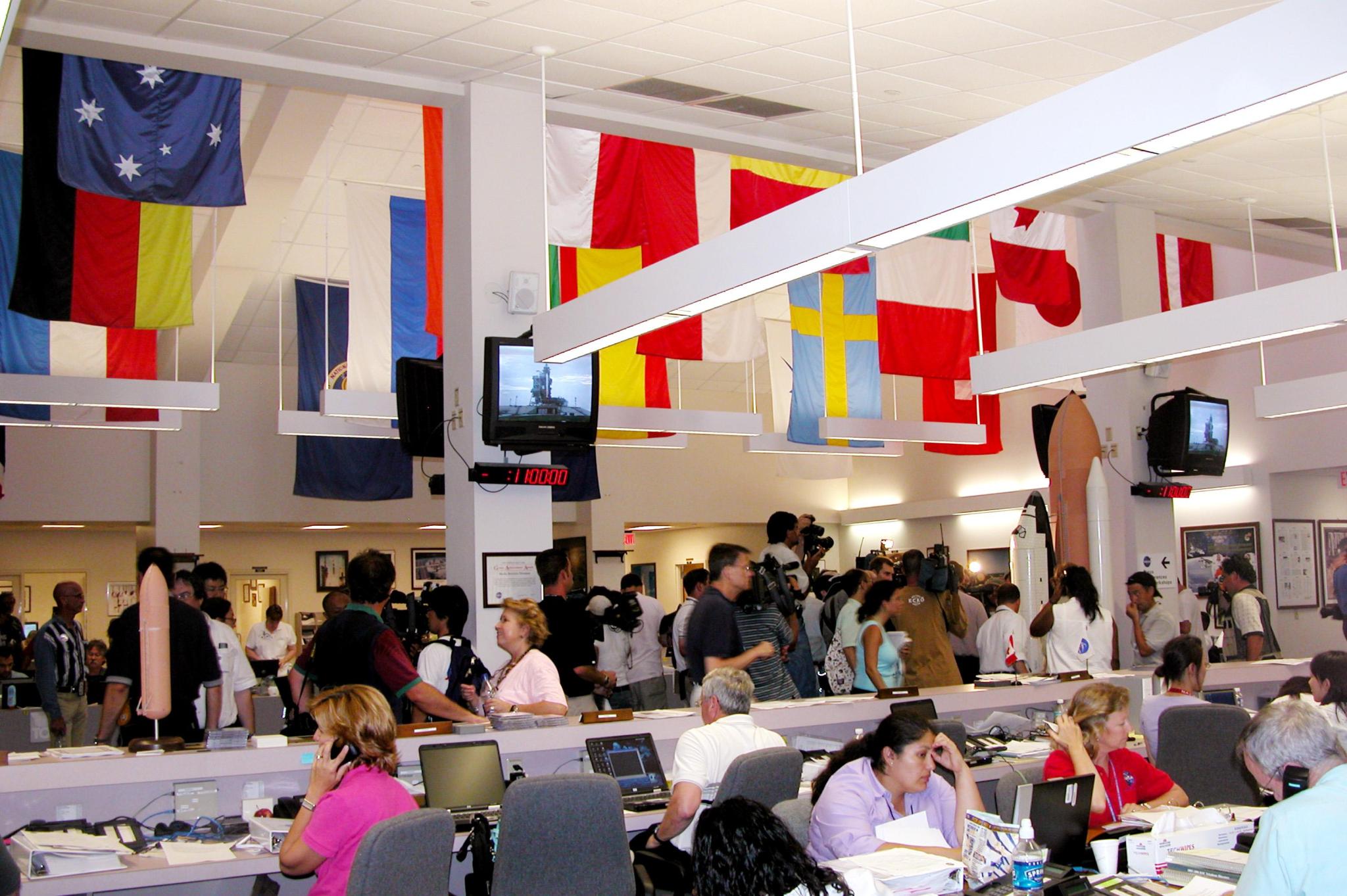 news media representatives in Kennedy Space Center newsroom
