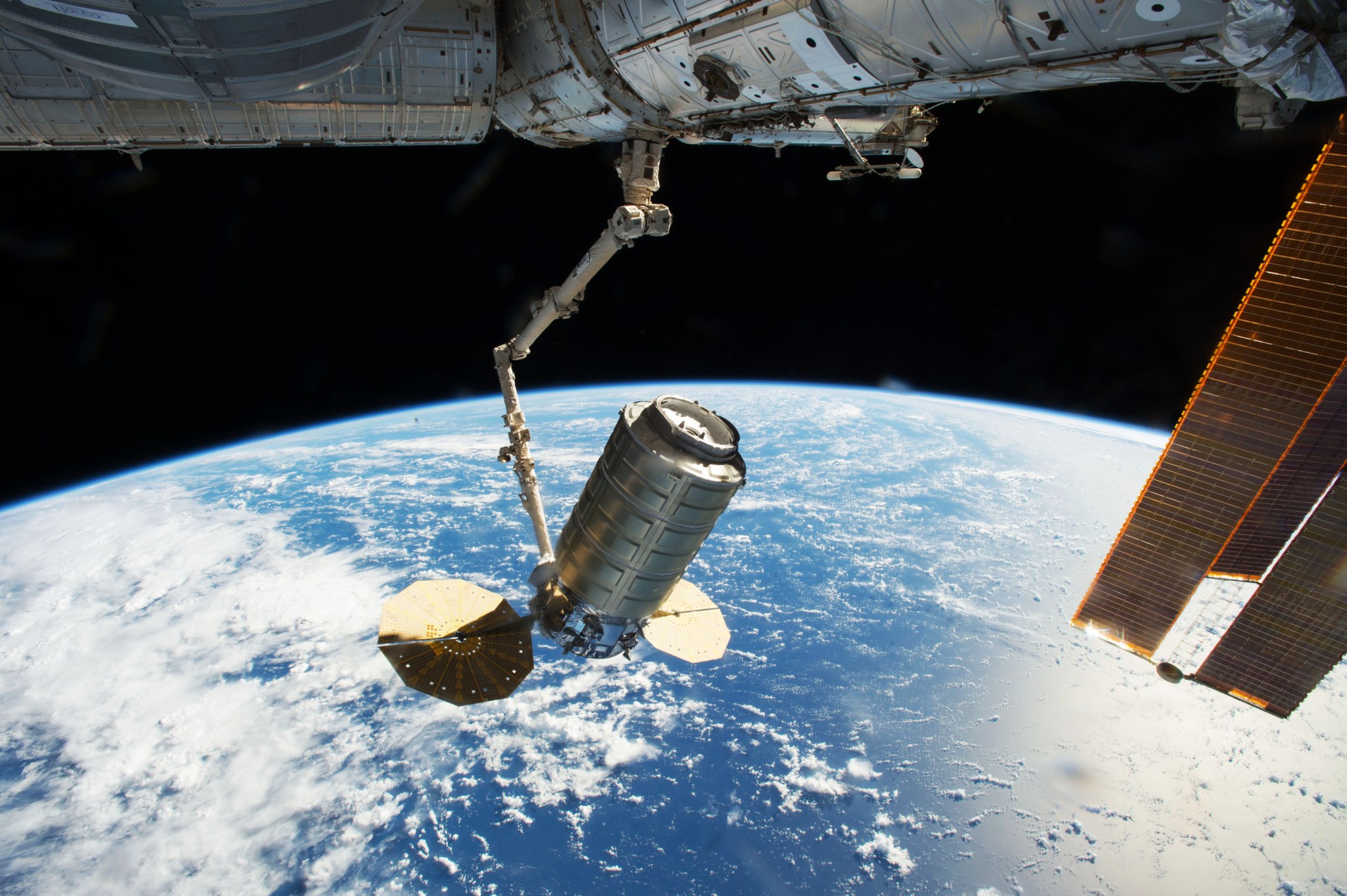 Cygnus cargo spacecraft is captured by ISS crew