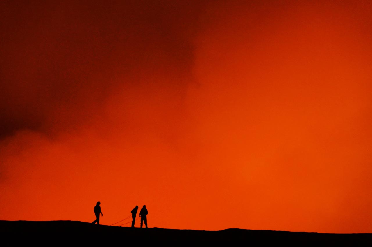 silhouettes on orange sky