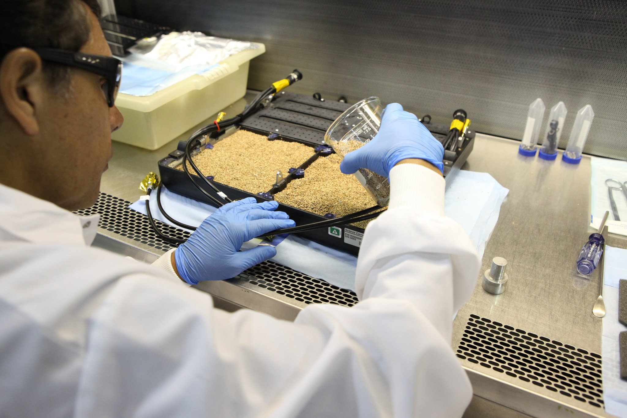 The base of the Advanced Plant Habitat is being prepared in the a lab at the SSPF.