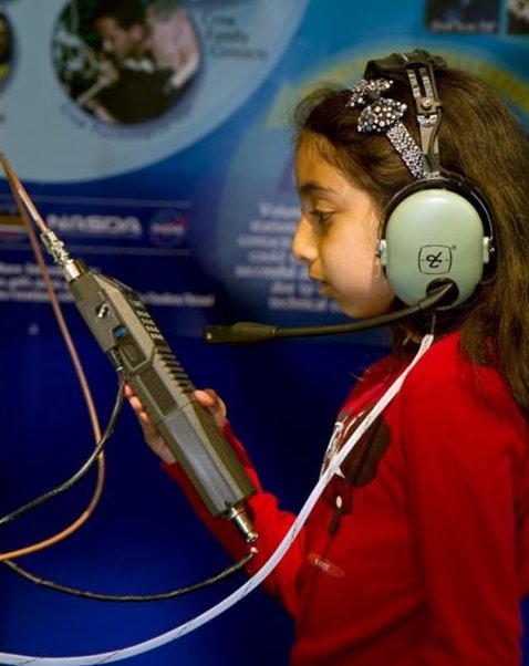 NASA astronaut Serena M. Auñón-Chancellor answers student questions during an education downlink event.