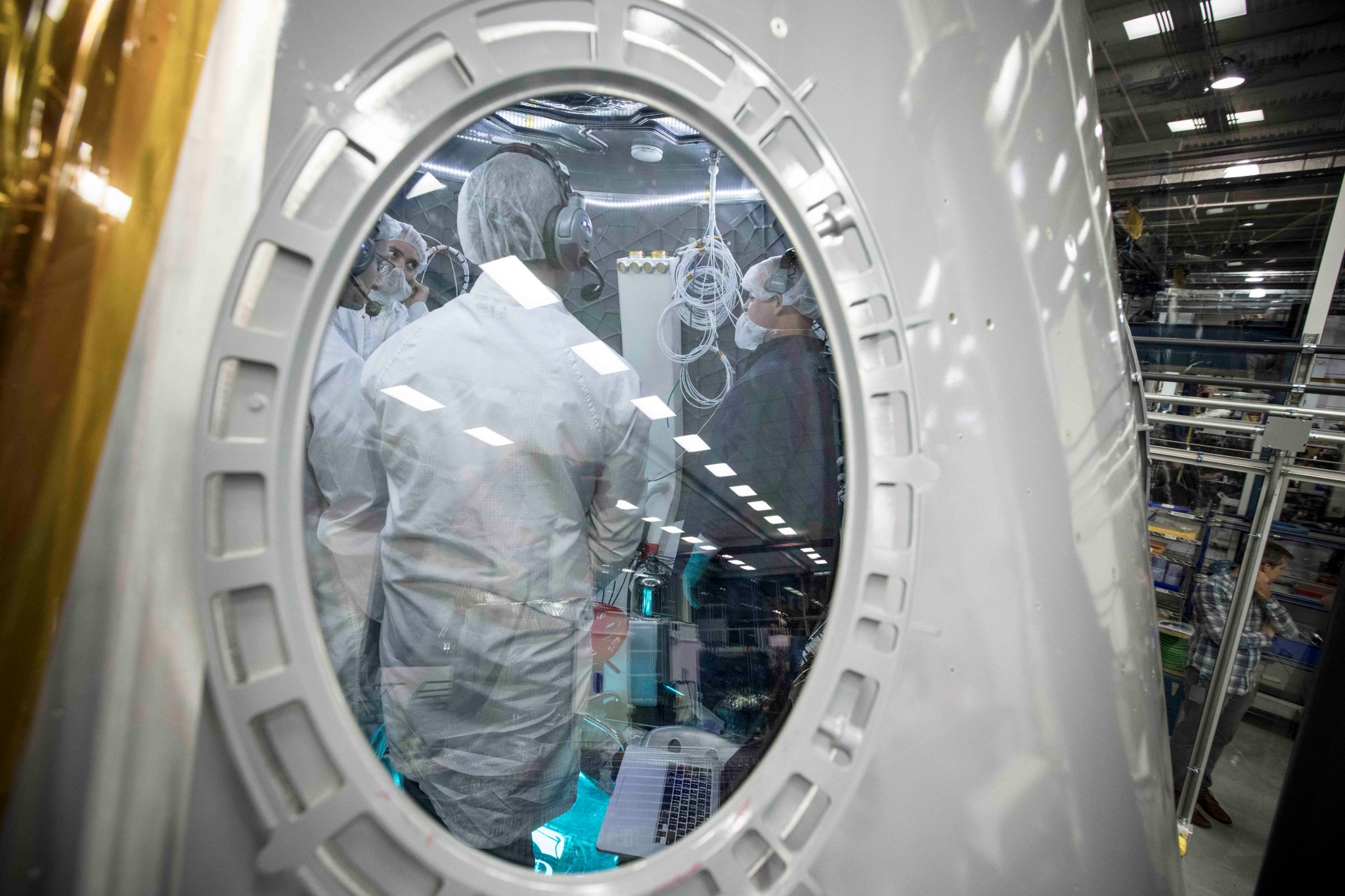 Engineers work inside the ECLSS Module