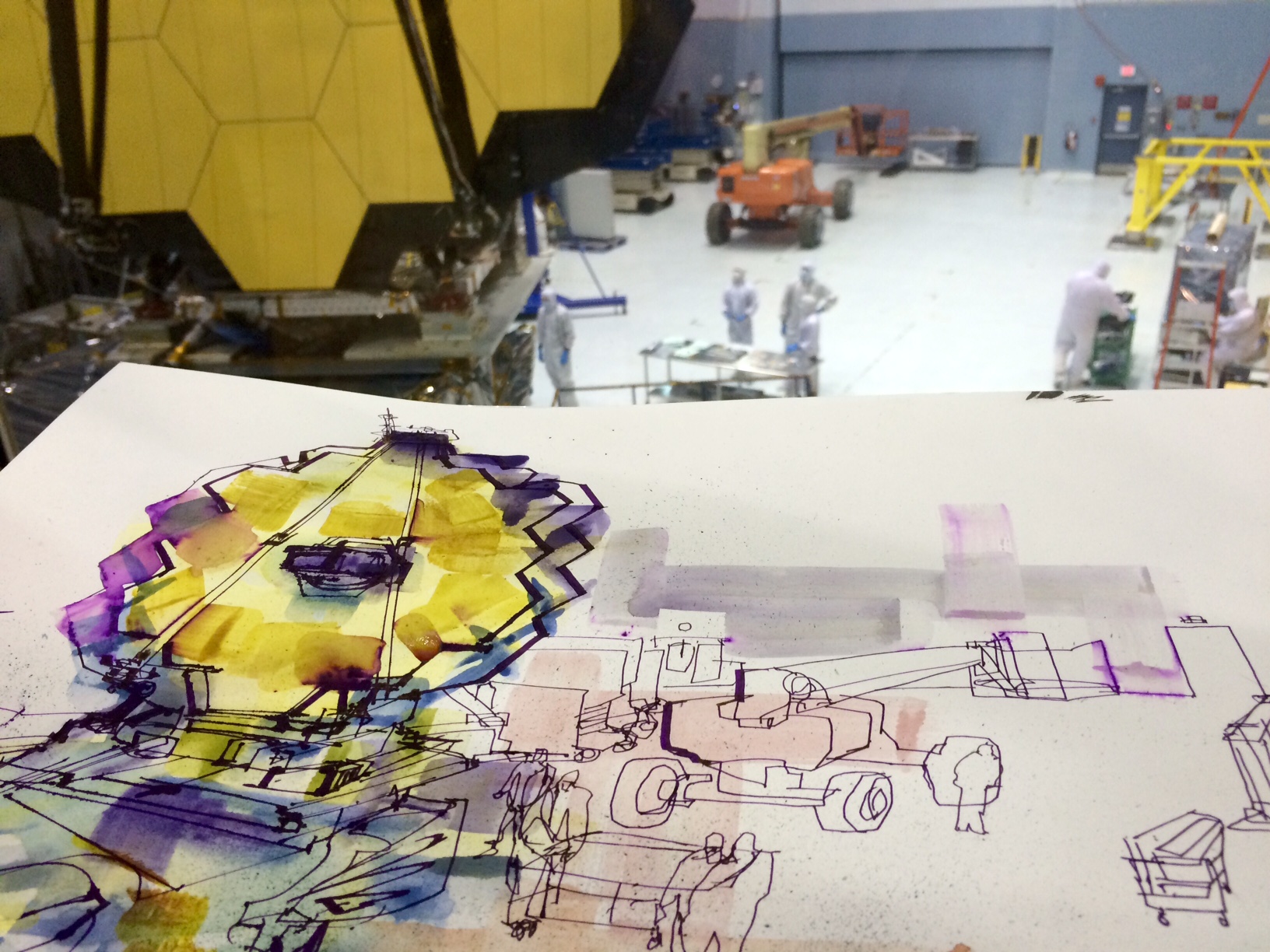 Jedidiah Dore’s ink and watercolor sketch photographed in front of the James Webb Space Telescope.