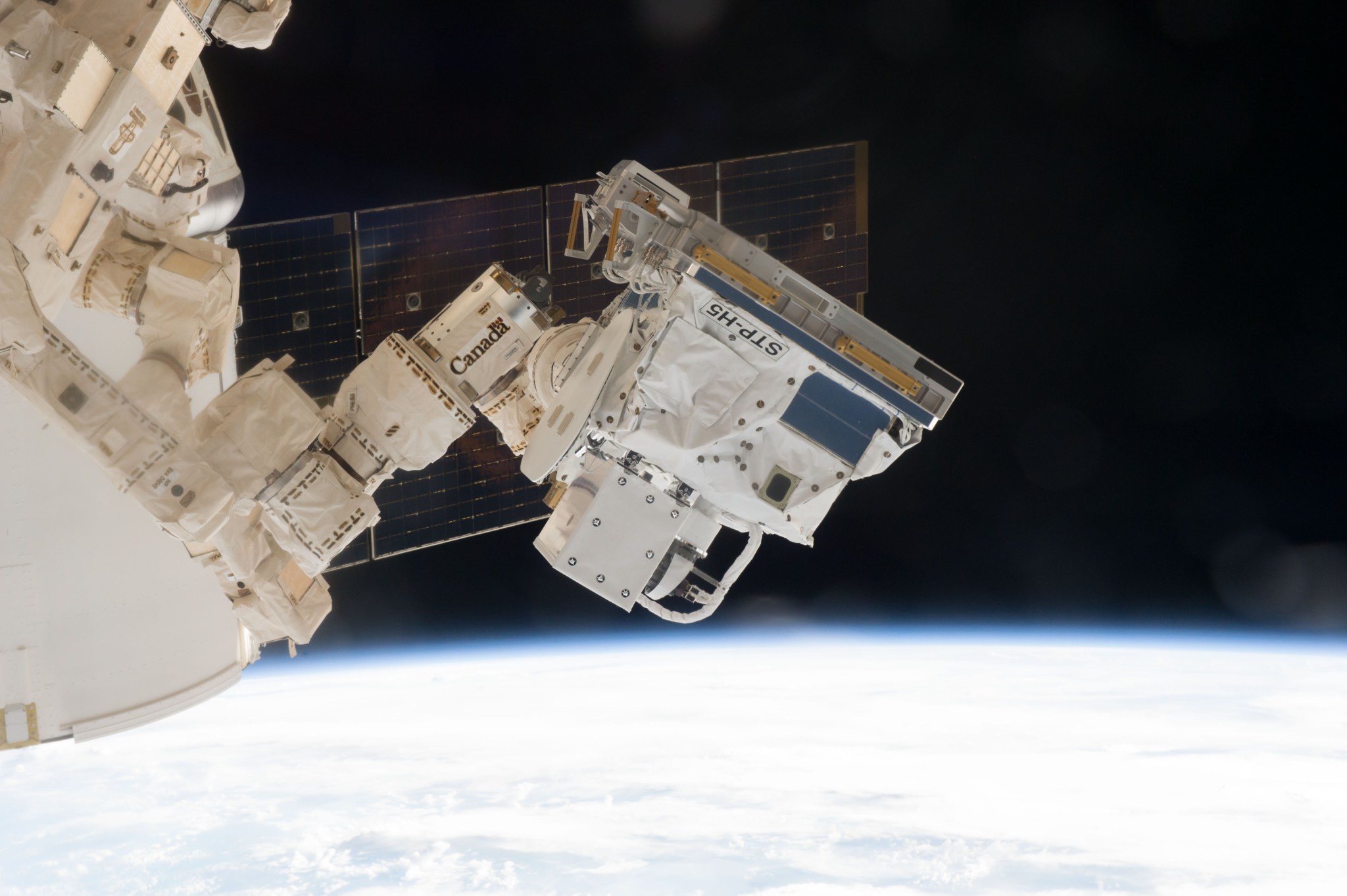 DOD's experiment pallet at the end of the Canada arm on the ISS