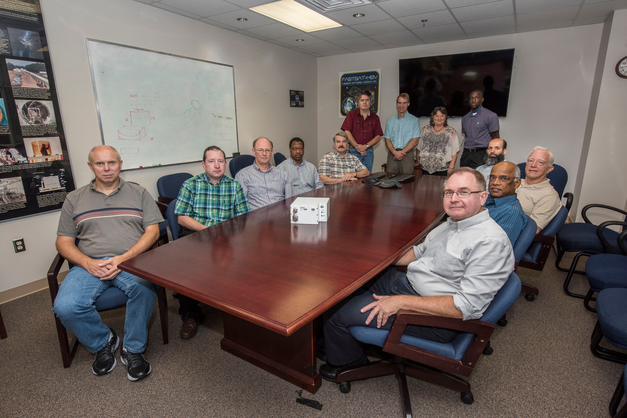The team of scientists and engineers that designed and built the Fast Neutron Spectrometer at Marshall Space Flight Center