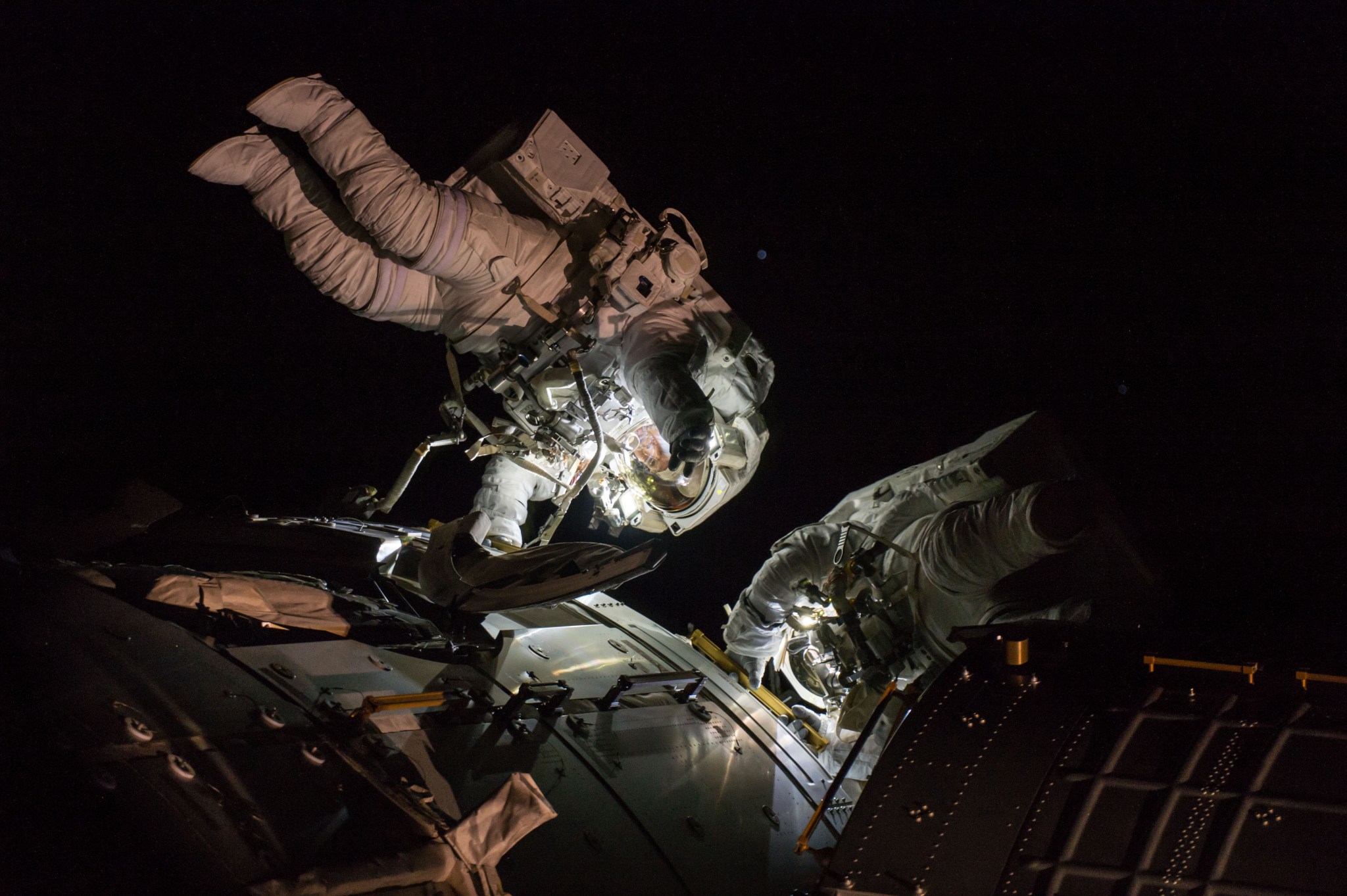 Shane Kimbrough and Peggy Whitson successfully reconnect cables and electrical connections during a seven-hour spacewalk.