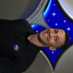 Kennedy Space Center's Jarrod Bales photographed in front of the Launch Services Program insignia.
