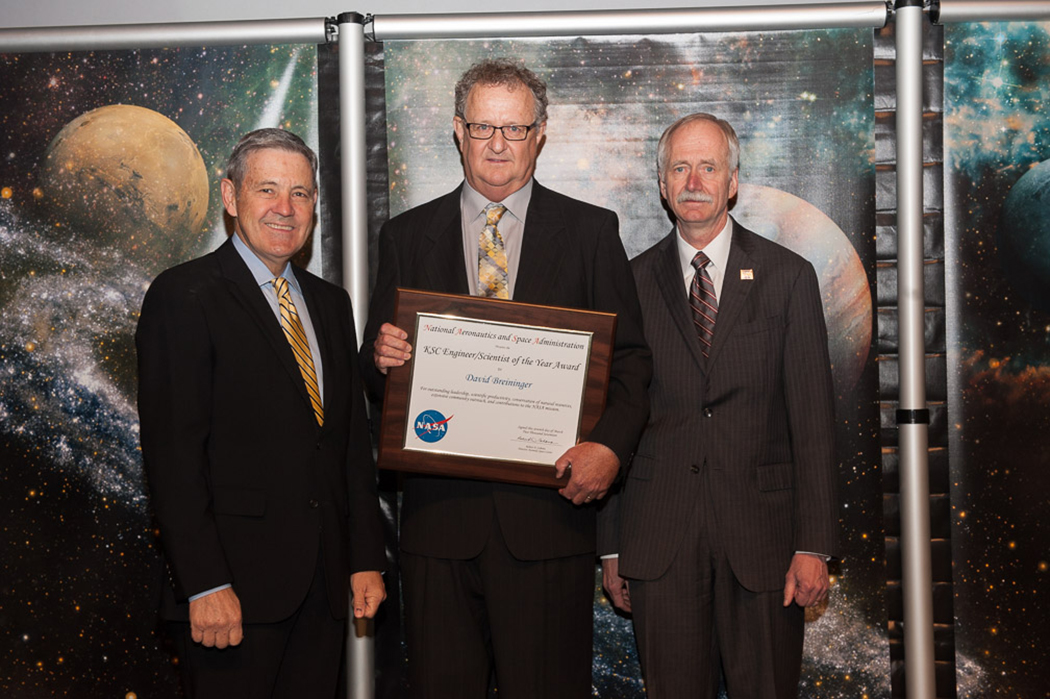 From left are Center Director Bob Cabana, Dr. Dave Breininger, Bill Gerstenmaier, AA for NASA Human Exploration and Operations
