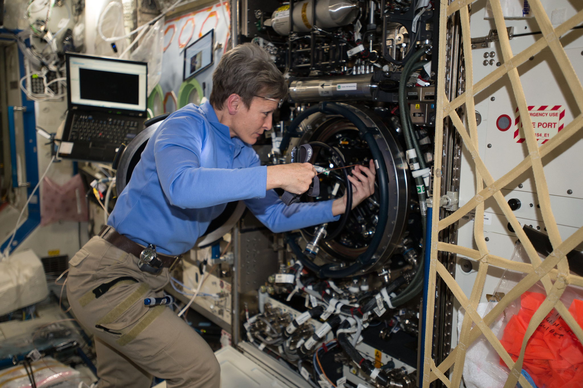 Expedition 51 Commander Peggy Whitson of NASA performs investigative troubleshooting in December 2016 