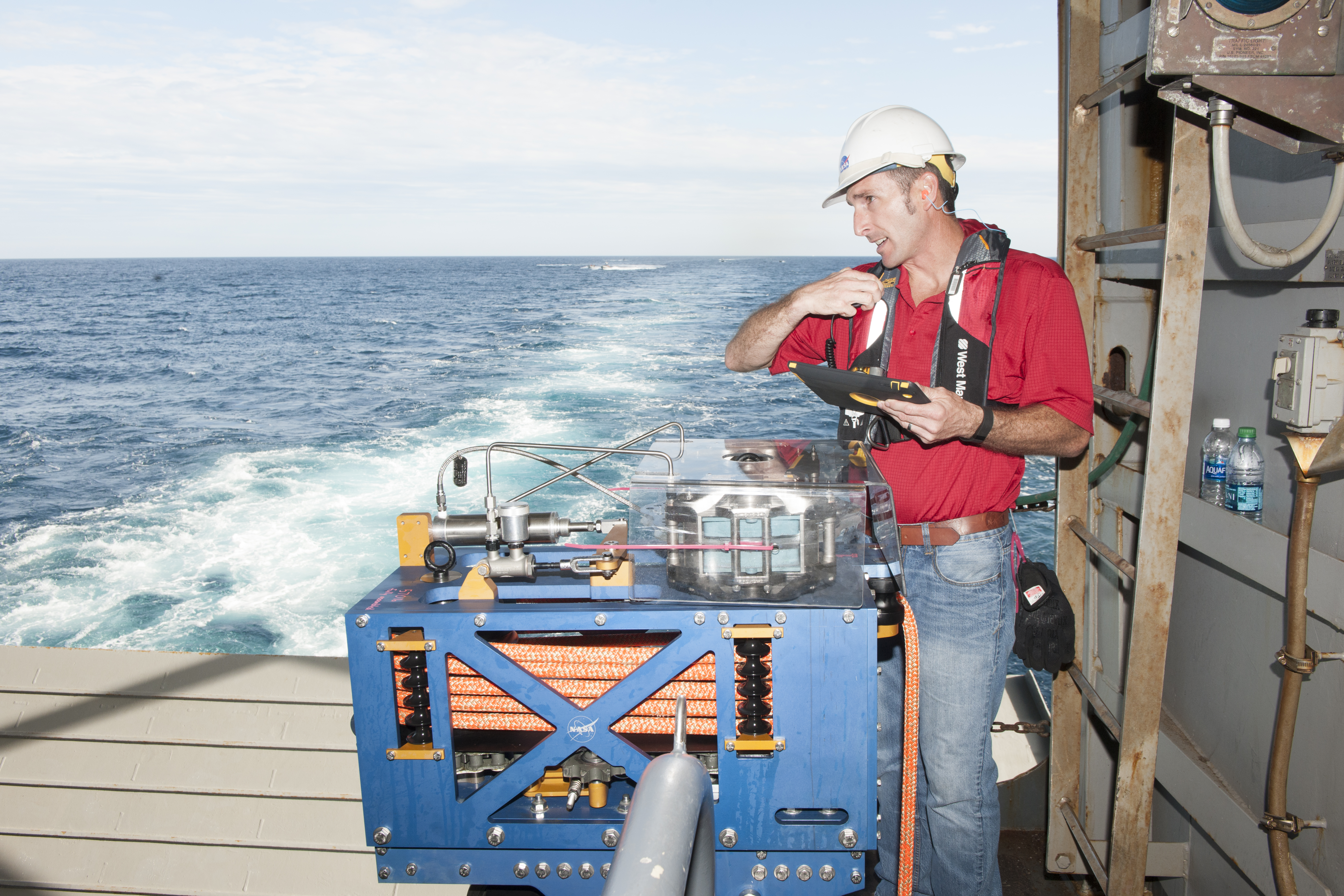 Jeremy Parr monitors the LLAMA during Underway Recovery Test 5 ion a ship n the Pacific Ocean