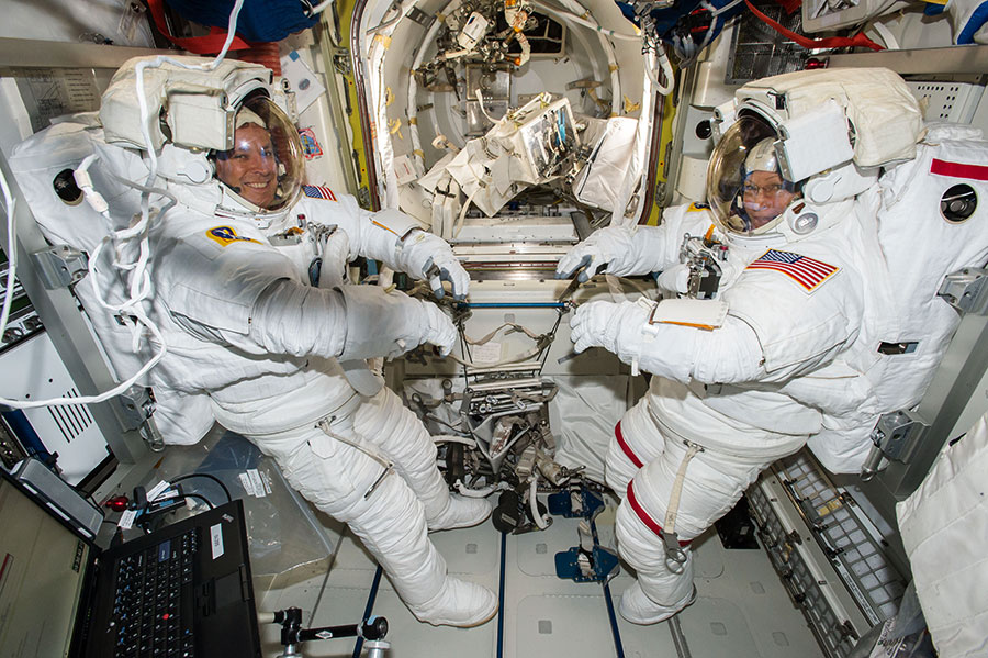 Astronauts Jack Fischer and Peggy Whitson
