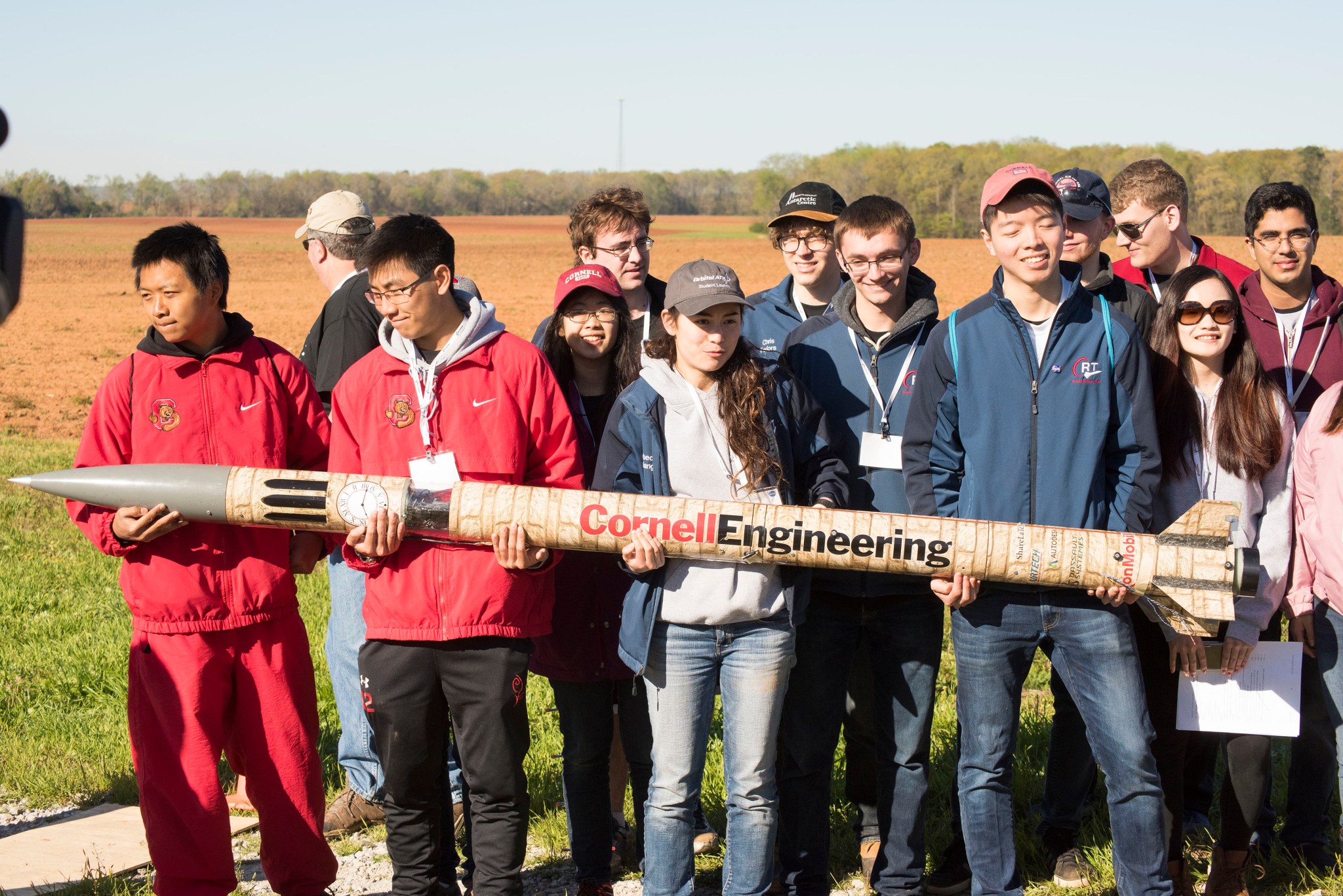 Students from Cornell University of Ithaca, in New York, display their rocket for an on-air interview with NASA TV. 