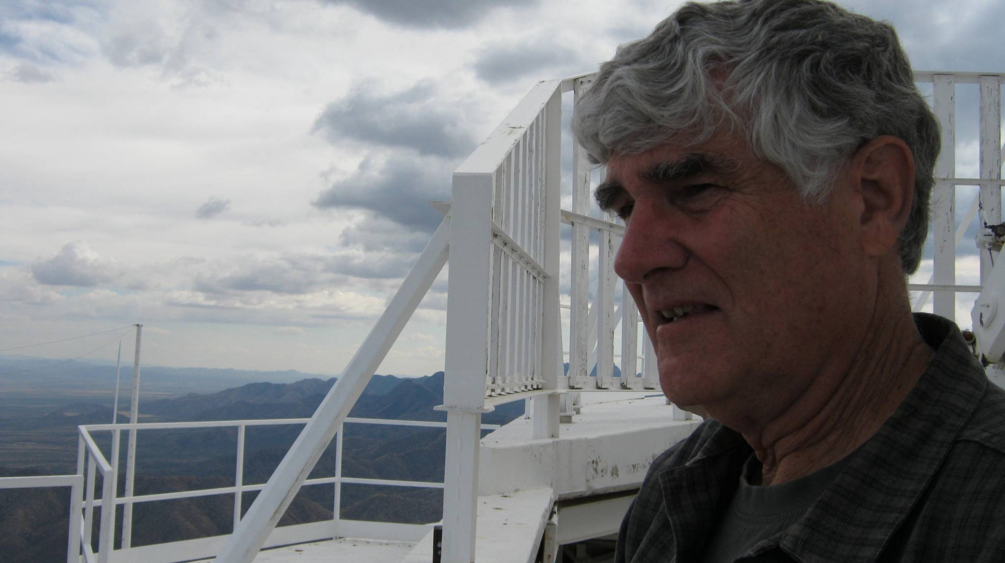 Jennings on the top of Kitt Peak, near Tucson Arizona, where planetary astronomy is performed.