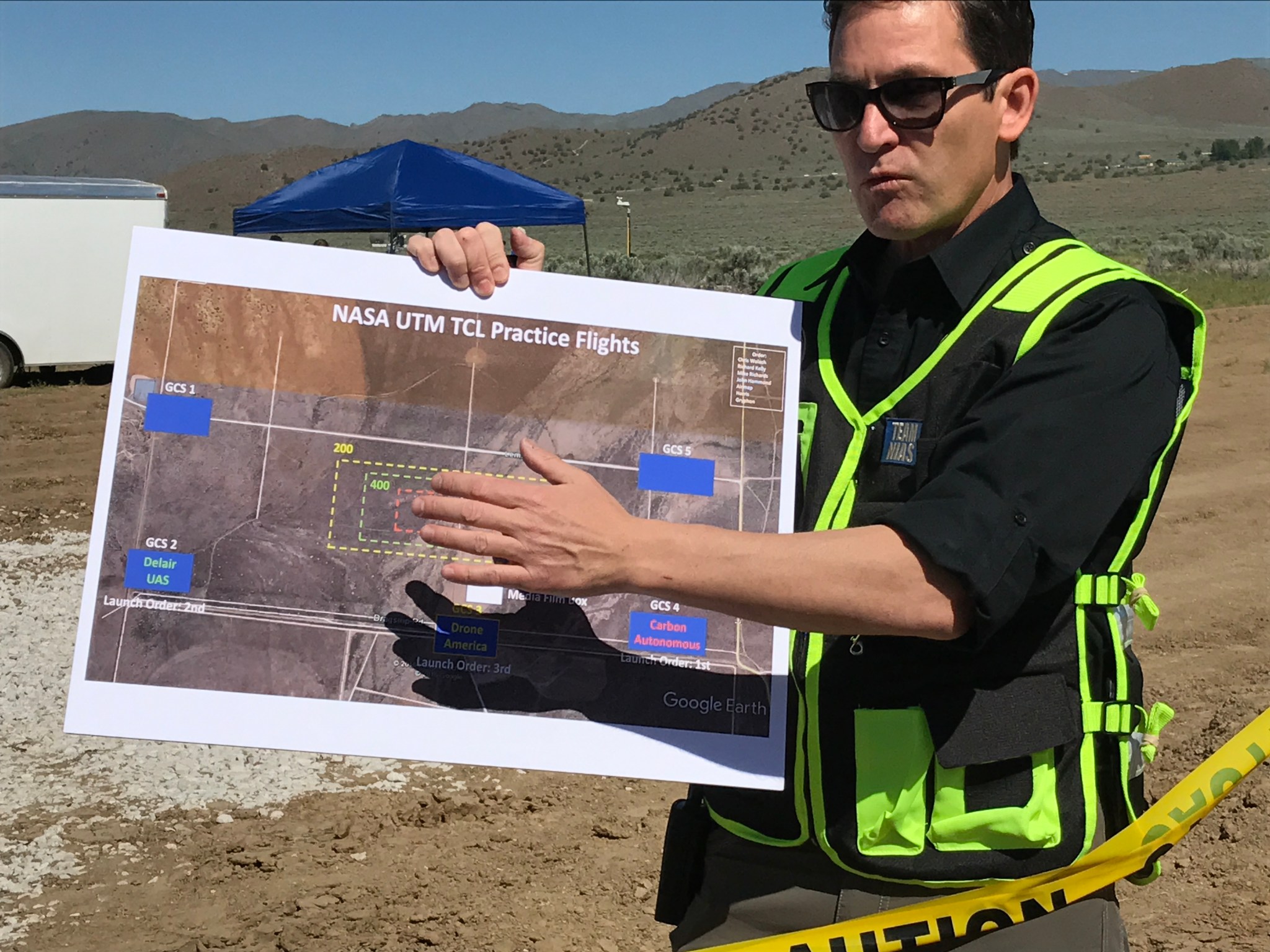 Chris Walach, director of the FAA-designated Nevada UAS Test Site, briefs team members on NASA’s UTM flight plan.