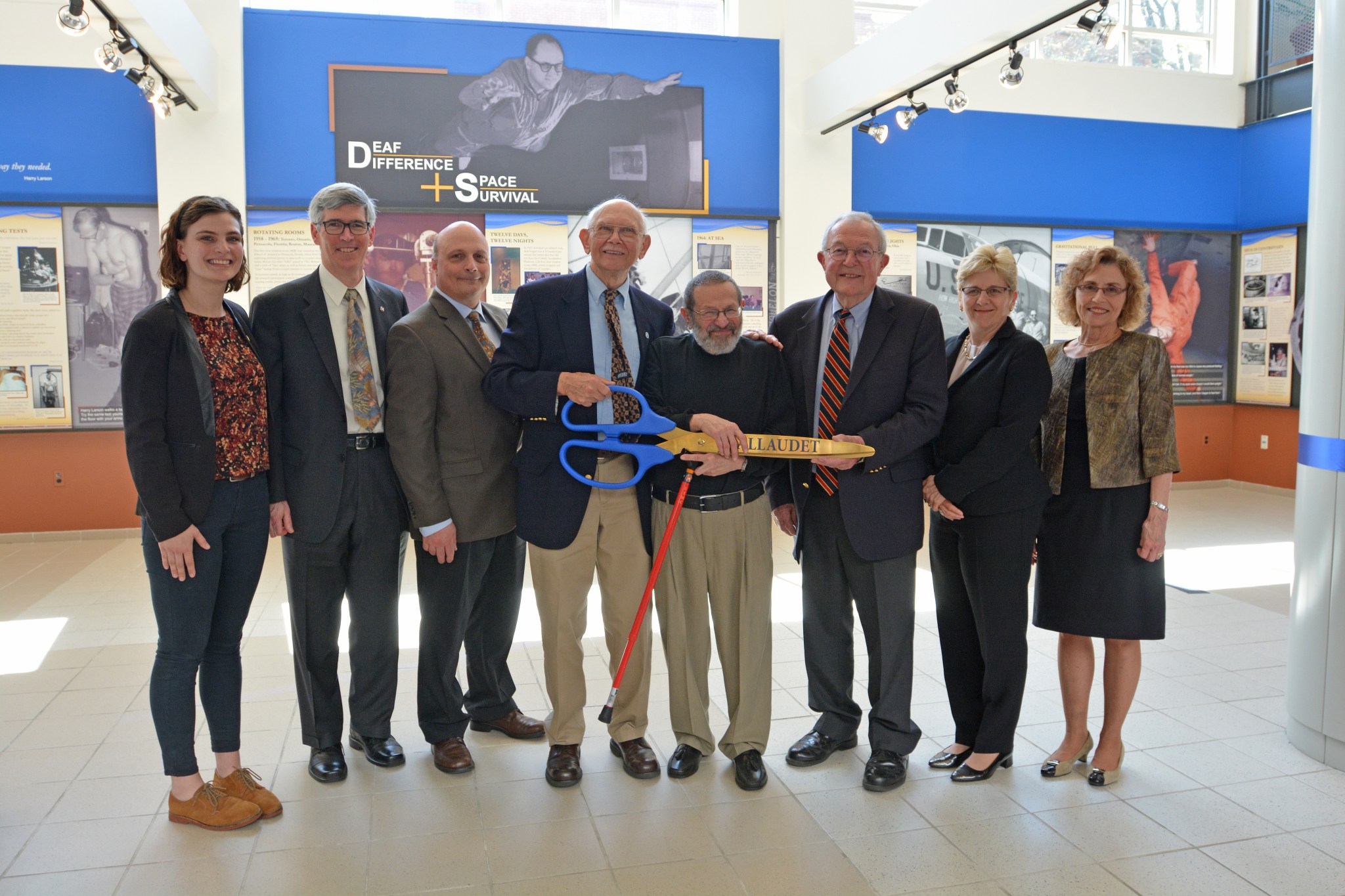 Ribbon-cutting ceremony for the Gallaudet exhibit. 