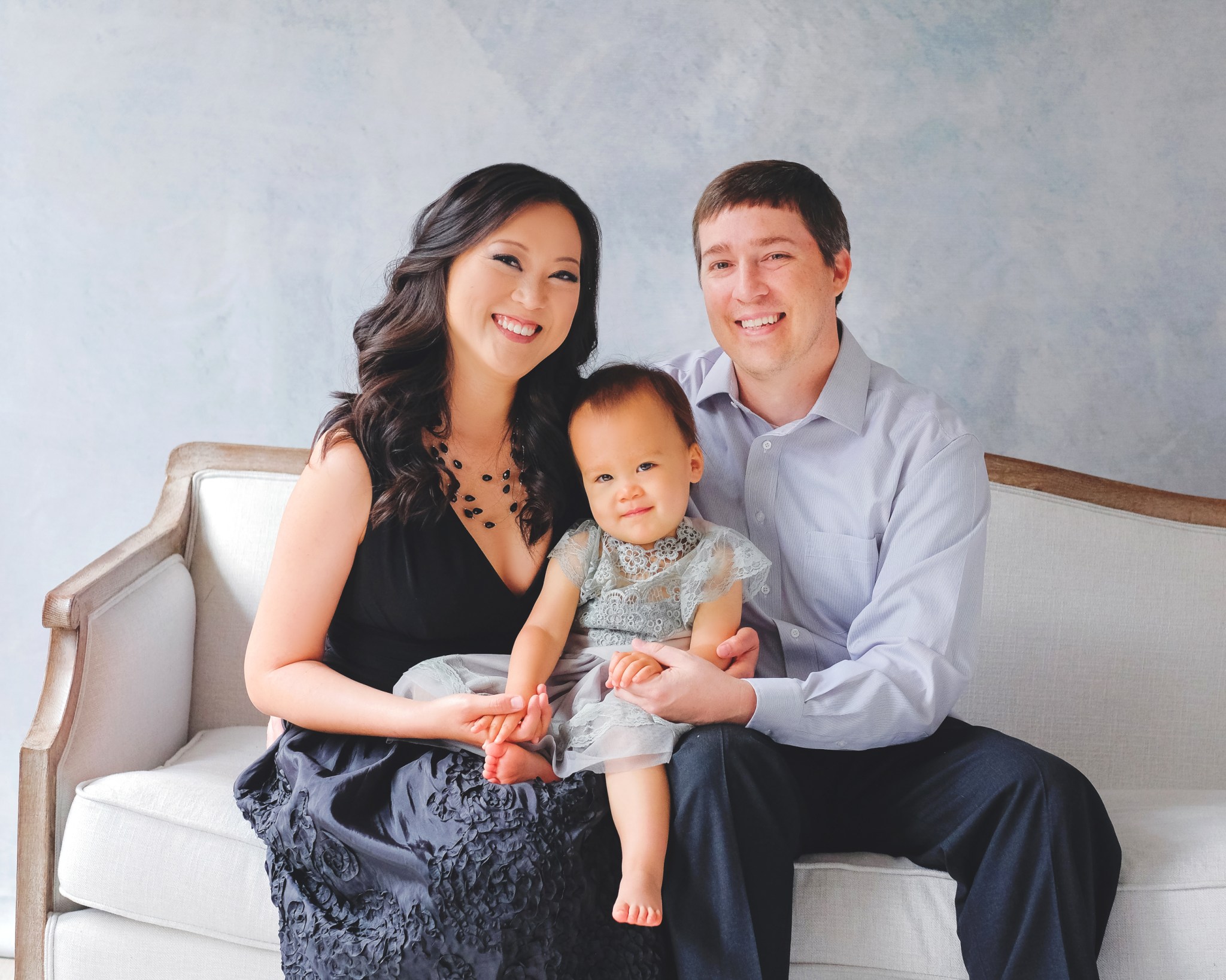 Eleasa and J.P. Wilson, both with the Payload Operations Integration Center and their 2-year-old daughter Emma. 