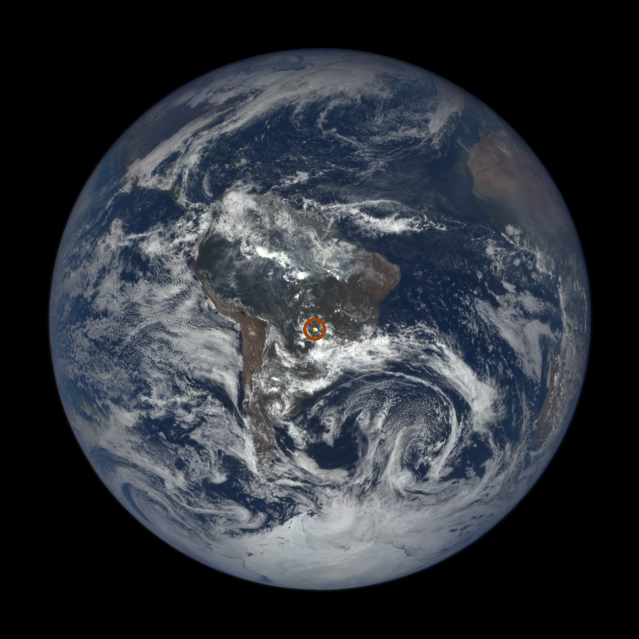 full globe image of Earth with flash in S. America