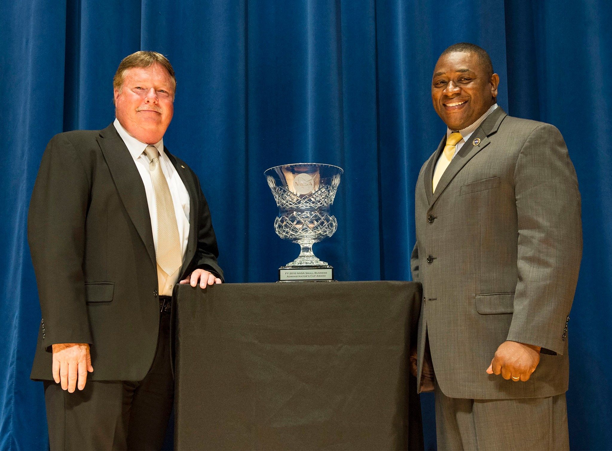 Stennis Office of Procurement Director Rob Harris (l) and former Stennis Small Business Specialist Robert Watts