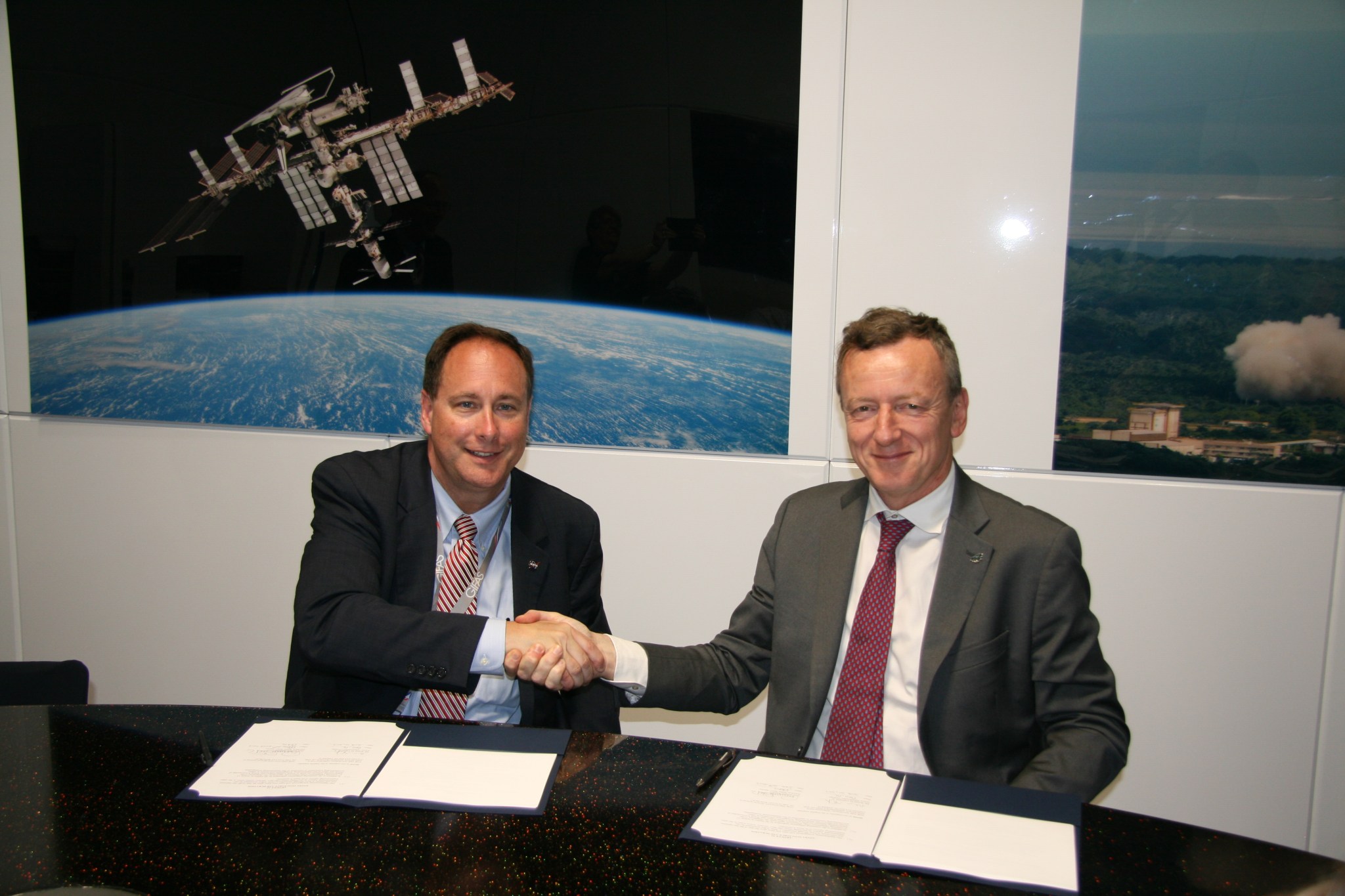 NASA acting Administrator Robert Lightfoot and Roberto Battiston, president of Italy's space agency Agenzia Spaziale Italiana