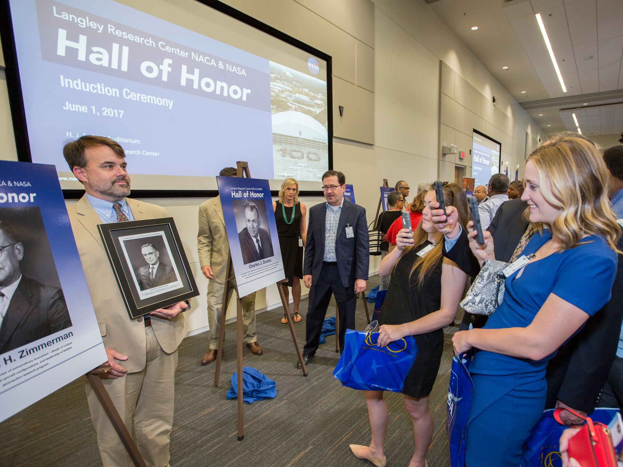 The family members of NASA Langley Hall of Honor inductee Charles Zimmerman pose after the induction ceremony.