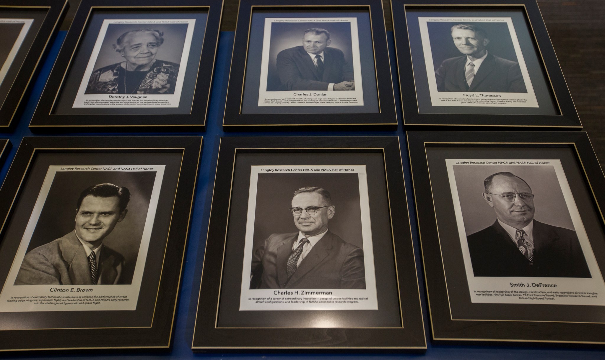 Portrait plaques wait to be handed out at the NASA Langley Hall of Honor induction ceremony.