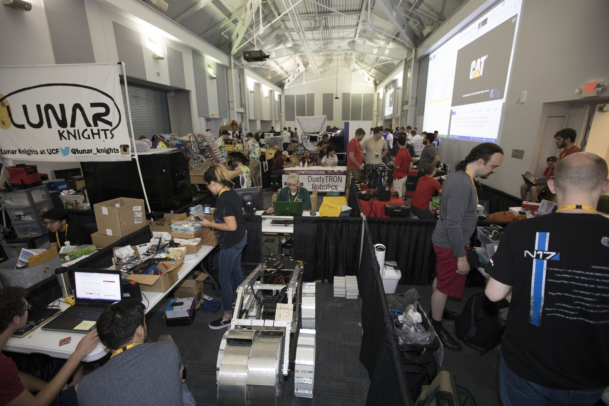 Teams prepare their robot miners in the RoboPit at the Kennedy Space Center Visitor Complex in Florida.