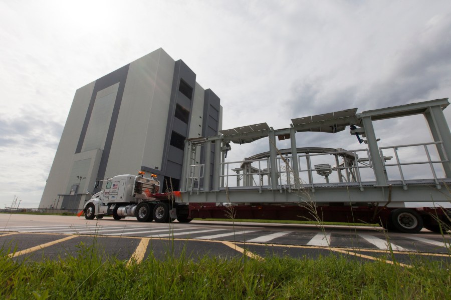 SLS booster service platforms arrive at Kennedy Space Center in Florida.