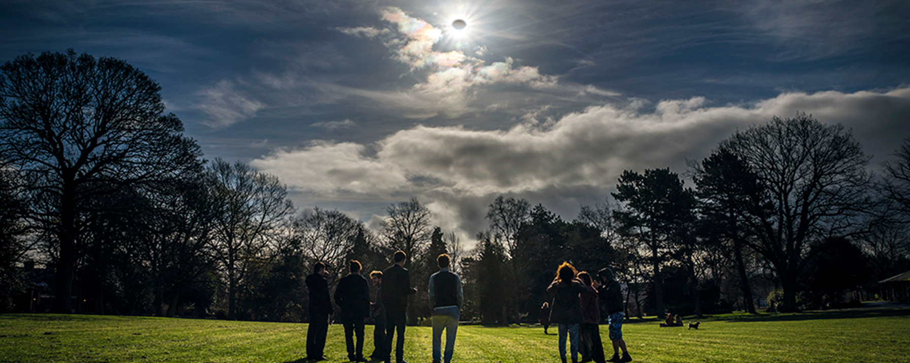 People Watching a Solar Eclipse